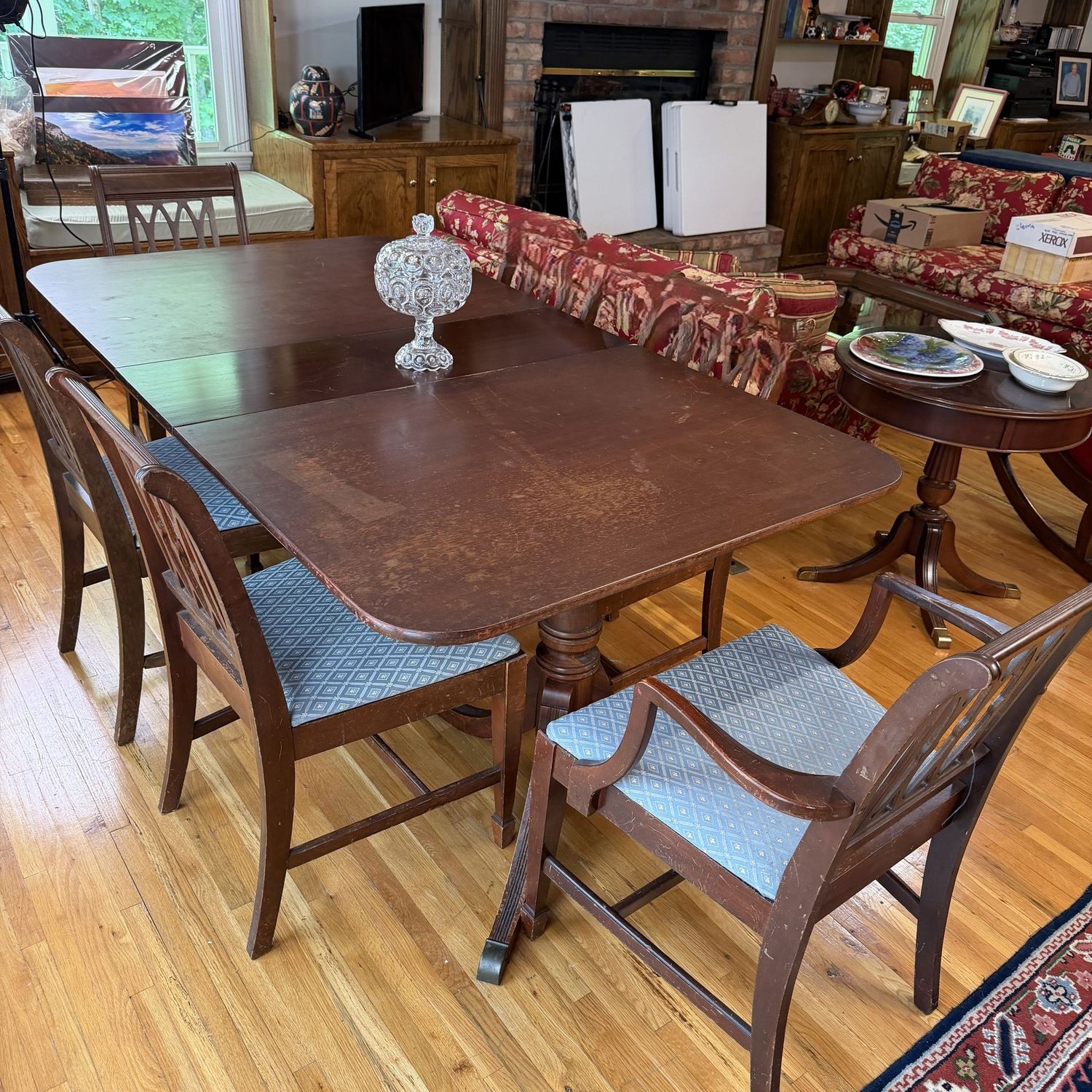 Vintage mahogany dining table with 4 chairs (3 side, 1 captain, some wear & scratches, sturdy double-pedestal, leaf stowes below table, 40"W x 6'L with leaf inserted