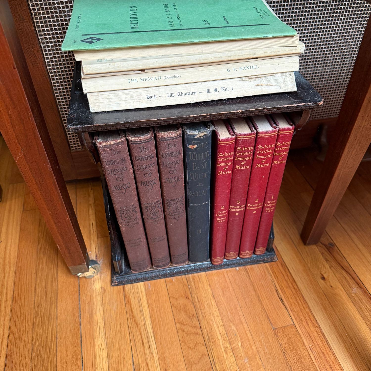 Antique desk bookshelf with a collection of music books, the hardcovers are 1908-1930s, shelf is 14"H x 12"W