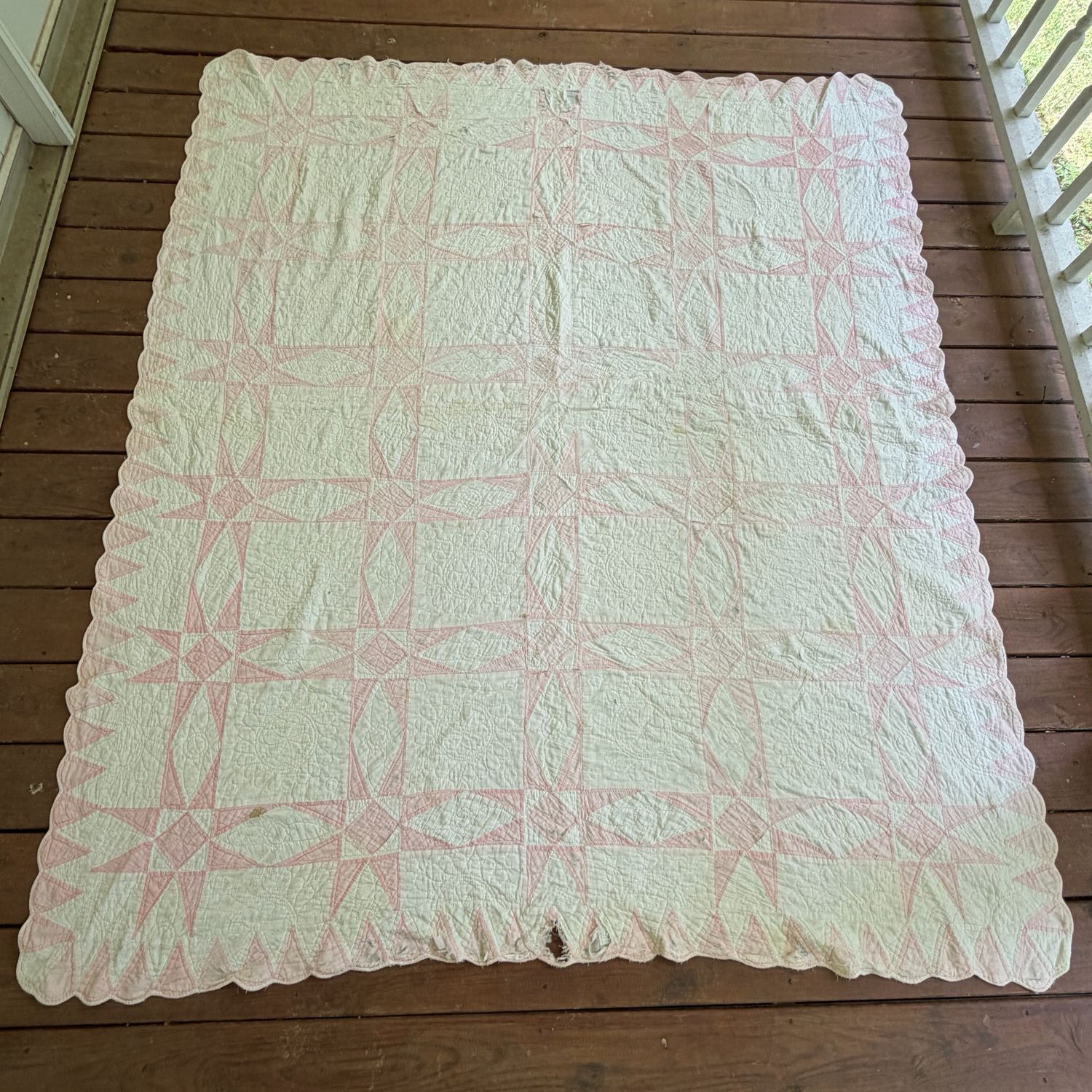 Pink and white geometric antique quilt, scalloped edge, some spots, thinness, and a few tears, 6'6 Pink and white geometric antique quilt, scalloped edge, some spots, thinness, and a few tears, 6'6" x 5'10"