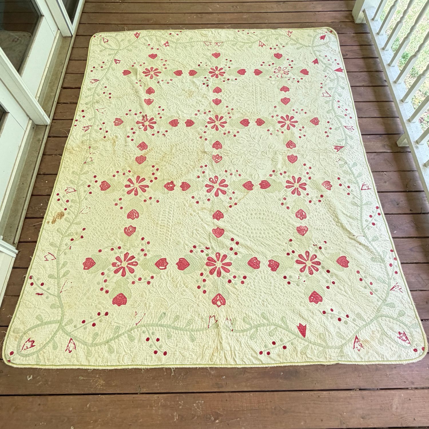 Antique handmade quilt with pink flowers, some stains, some thinning, intricate stitching, ca. 1880, 6'2 Antique handmade quilt with pink flowers, some stains, some thinning, intricate stitching, ca. 1880, 6'2" x 7'5"