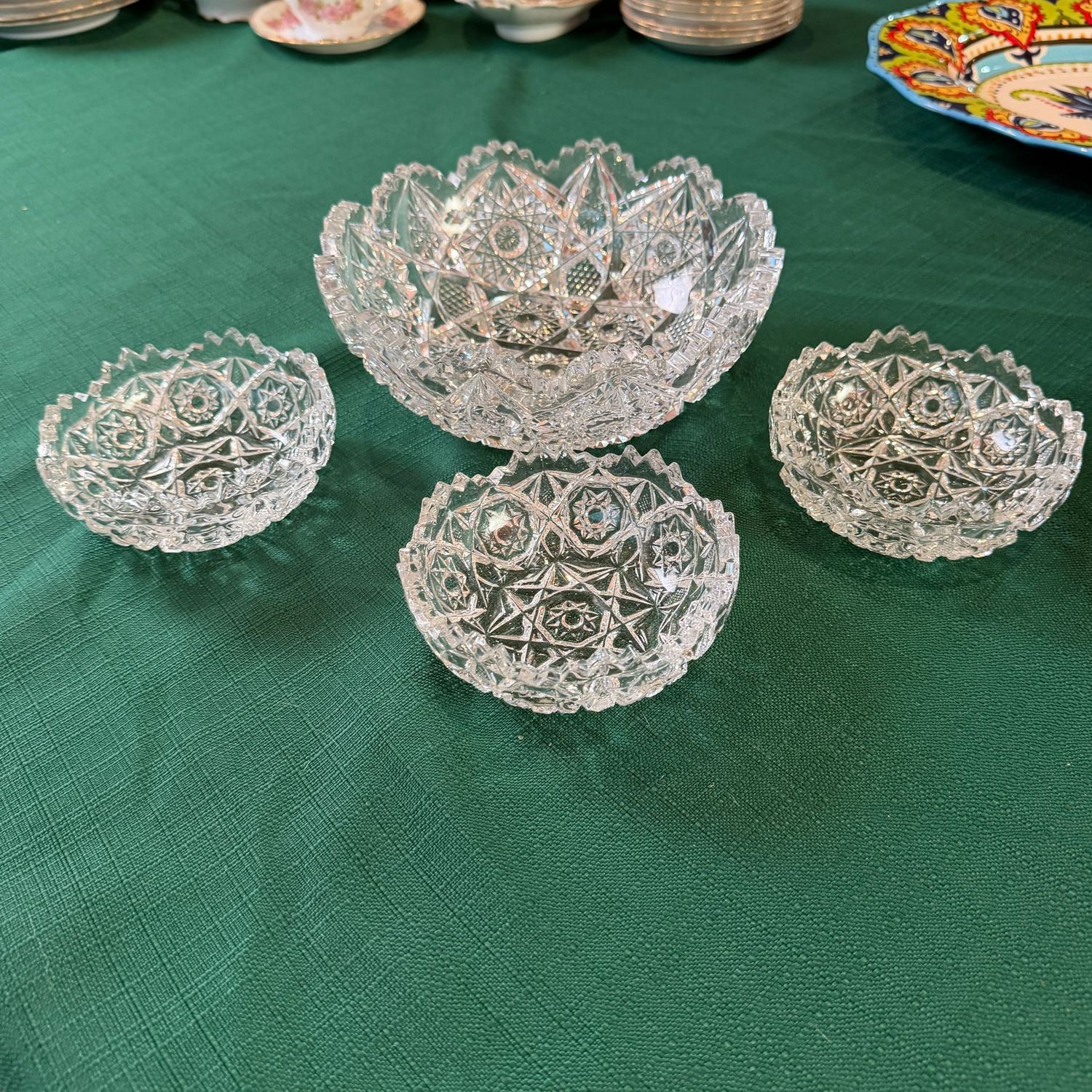Vintage saw tooth, floral and hobstar 8 Vintage saw tooth, floral and hobstar 8" bowl with three small, berry bowls