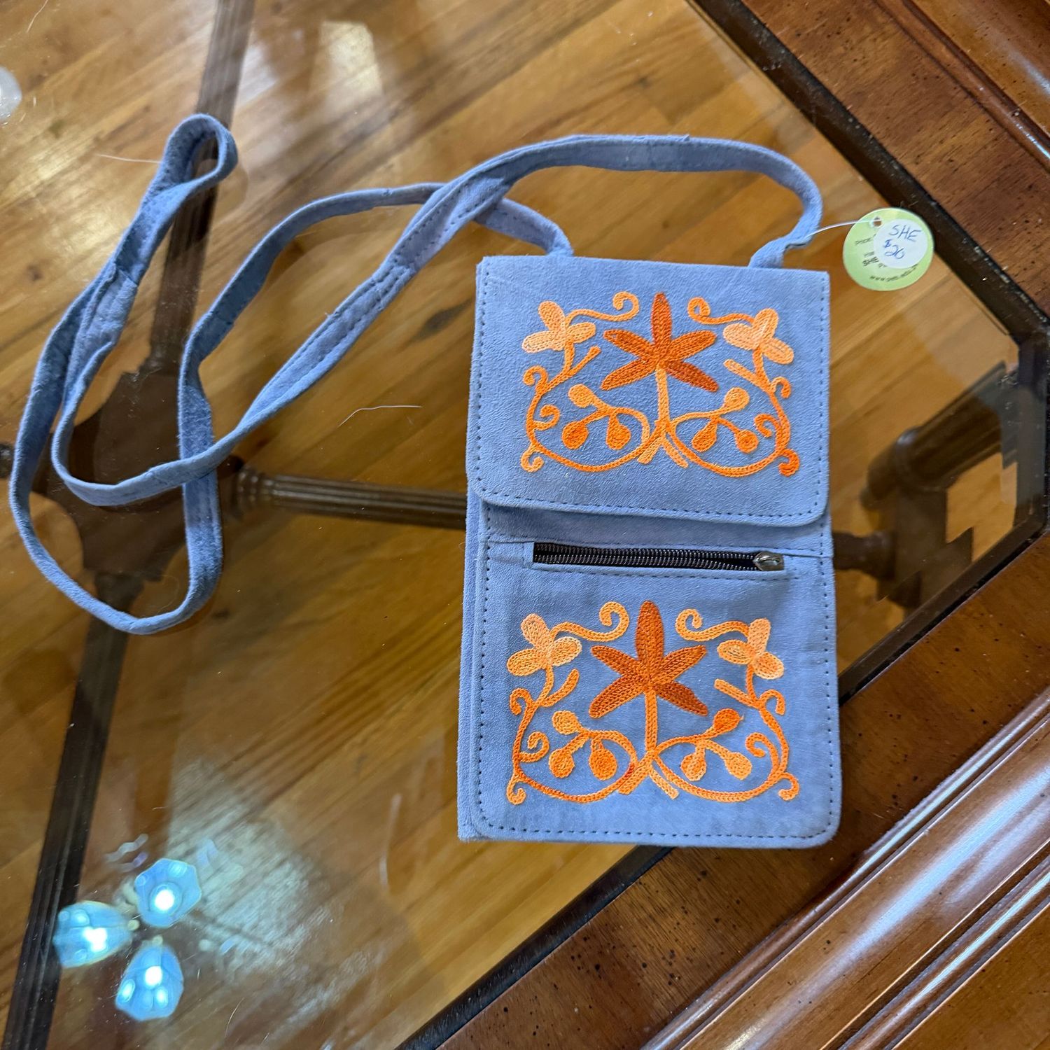Light blue crossbody purse with tangerine embroidery, new, 8 Light blue crossbody purse with tangerine embroidery, new, 8"L