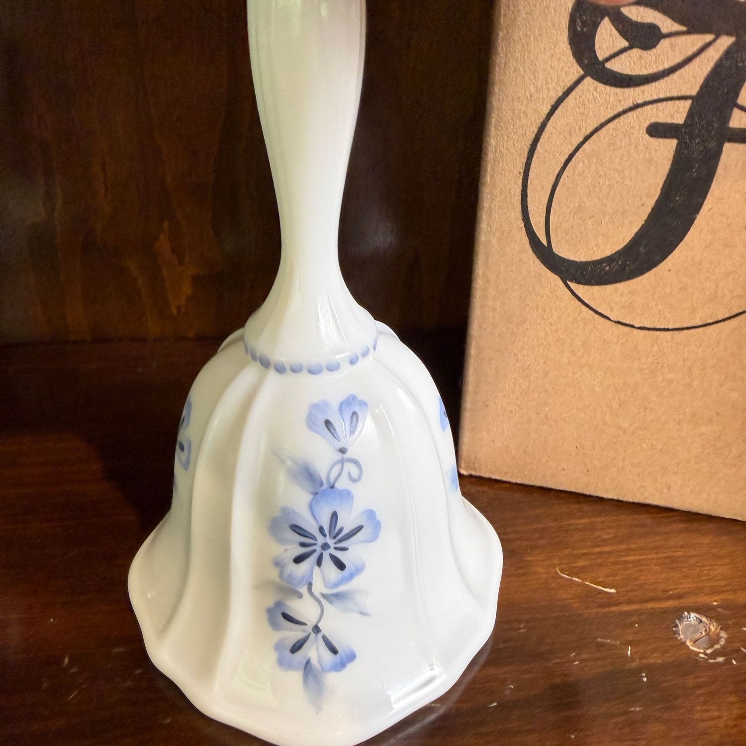Hand-painted milk glass Fenton bell, approx. 8", with box