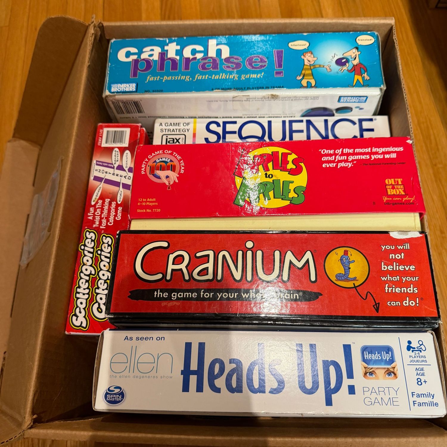 Group of games, including Catch Phrase, Head's Up