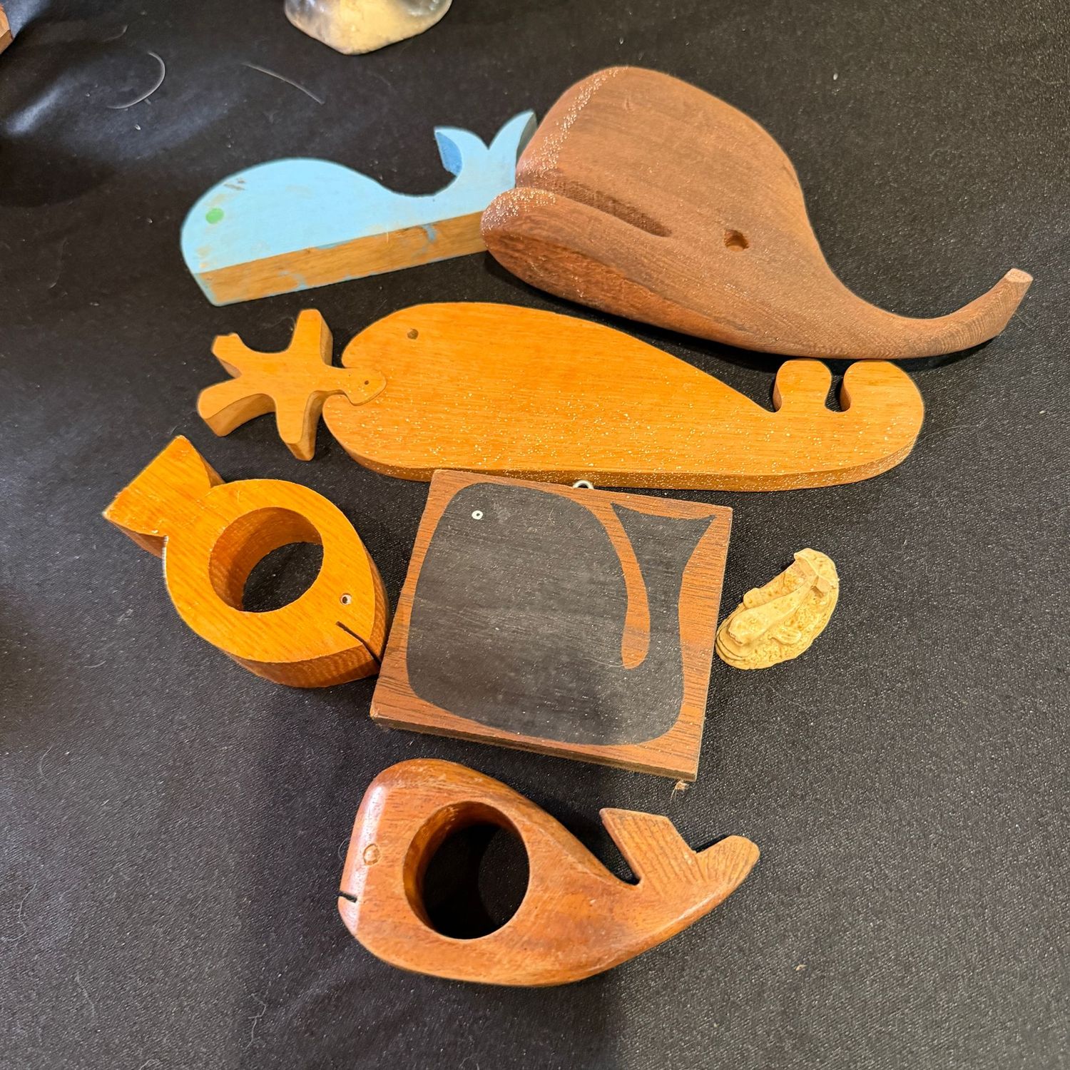 Group of wooden whales, 1-5 Group of wooden whales, 1-5"