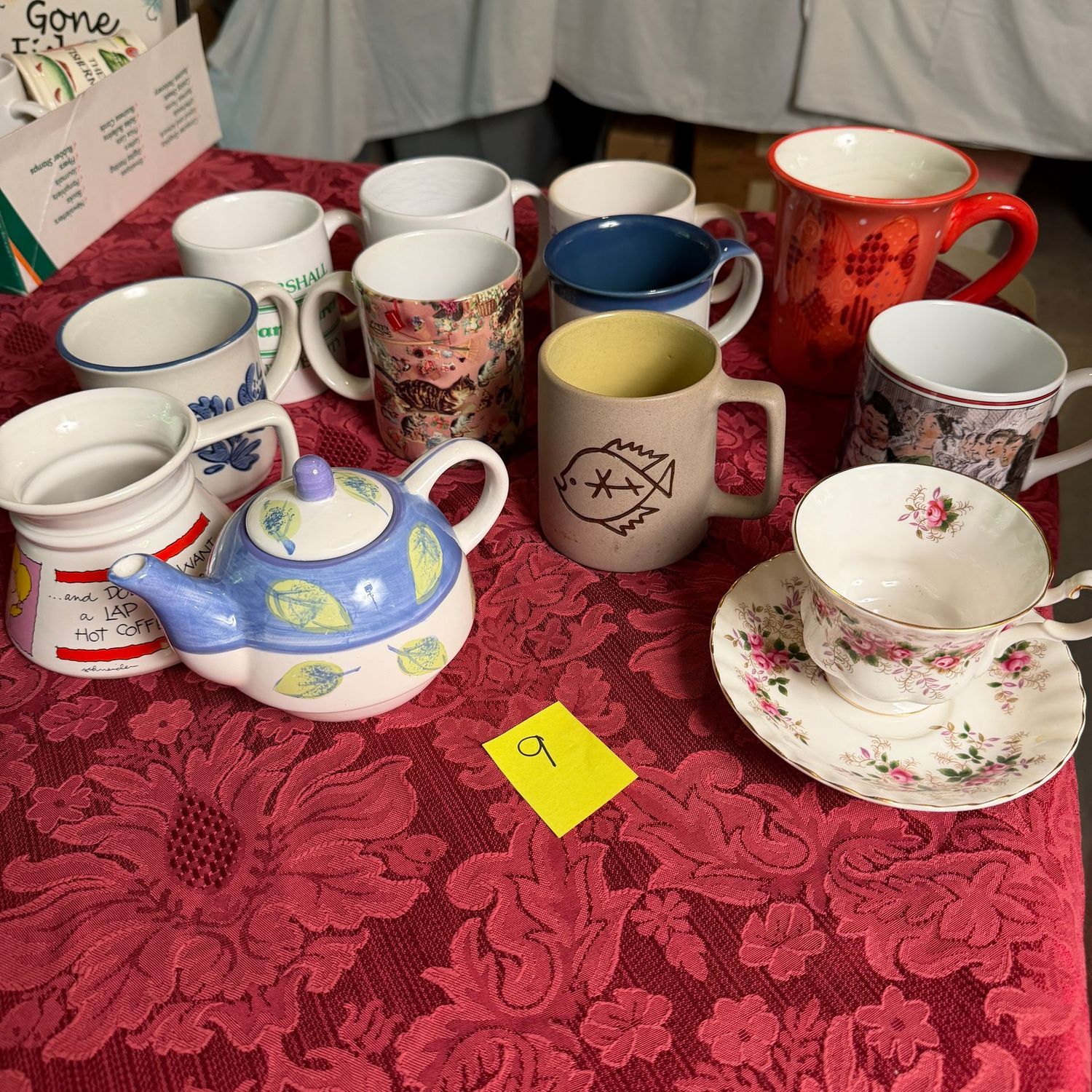 Lot #9, group of mugs and small teapot Lot #9, group of mugs and small teapot