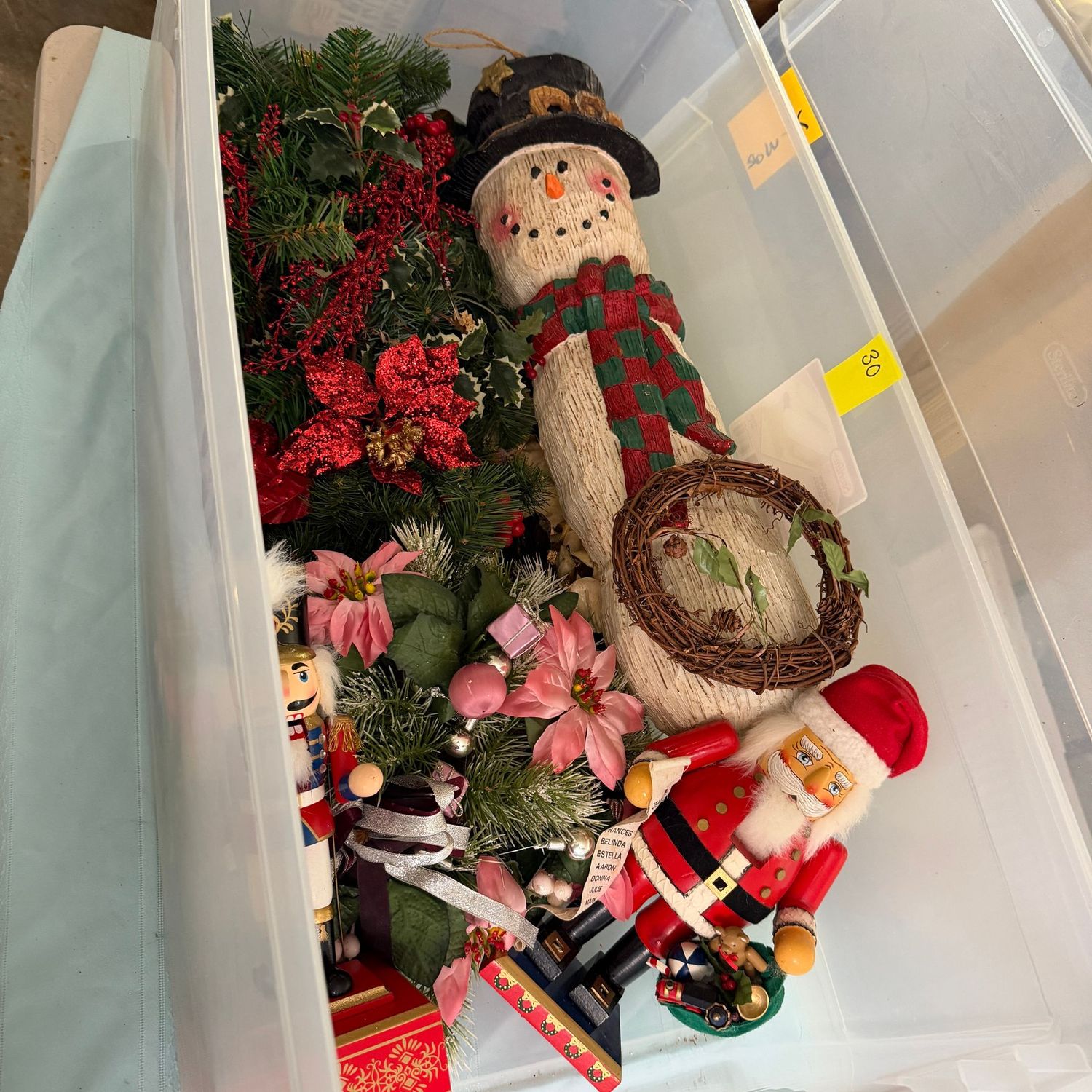 Lot #30, long bin with evergreen wall decoration, nutcrackers, snowman Lot #30, long bin with evergreen wall decoration, nutcrackers, snowman