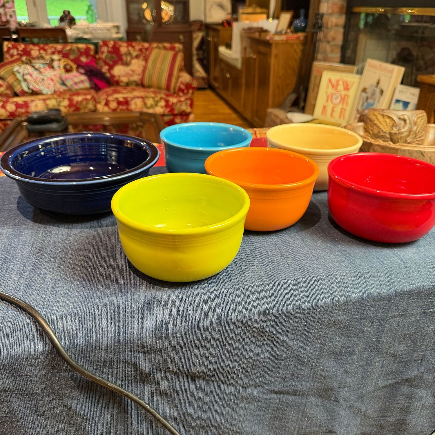 Group of Fiesta Ware bowls, the largest is 8"W, some wear
