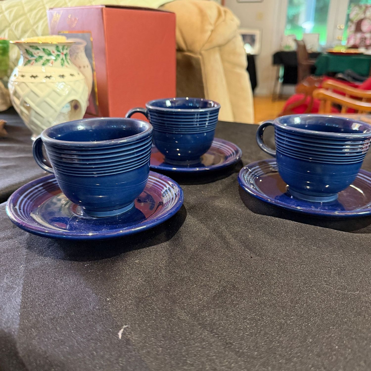 Three blue Fiesta Ware cappuccino cups and saucers Three blue Fiesta Ware cappuccino cups and saucers