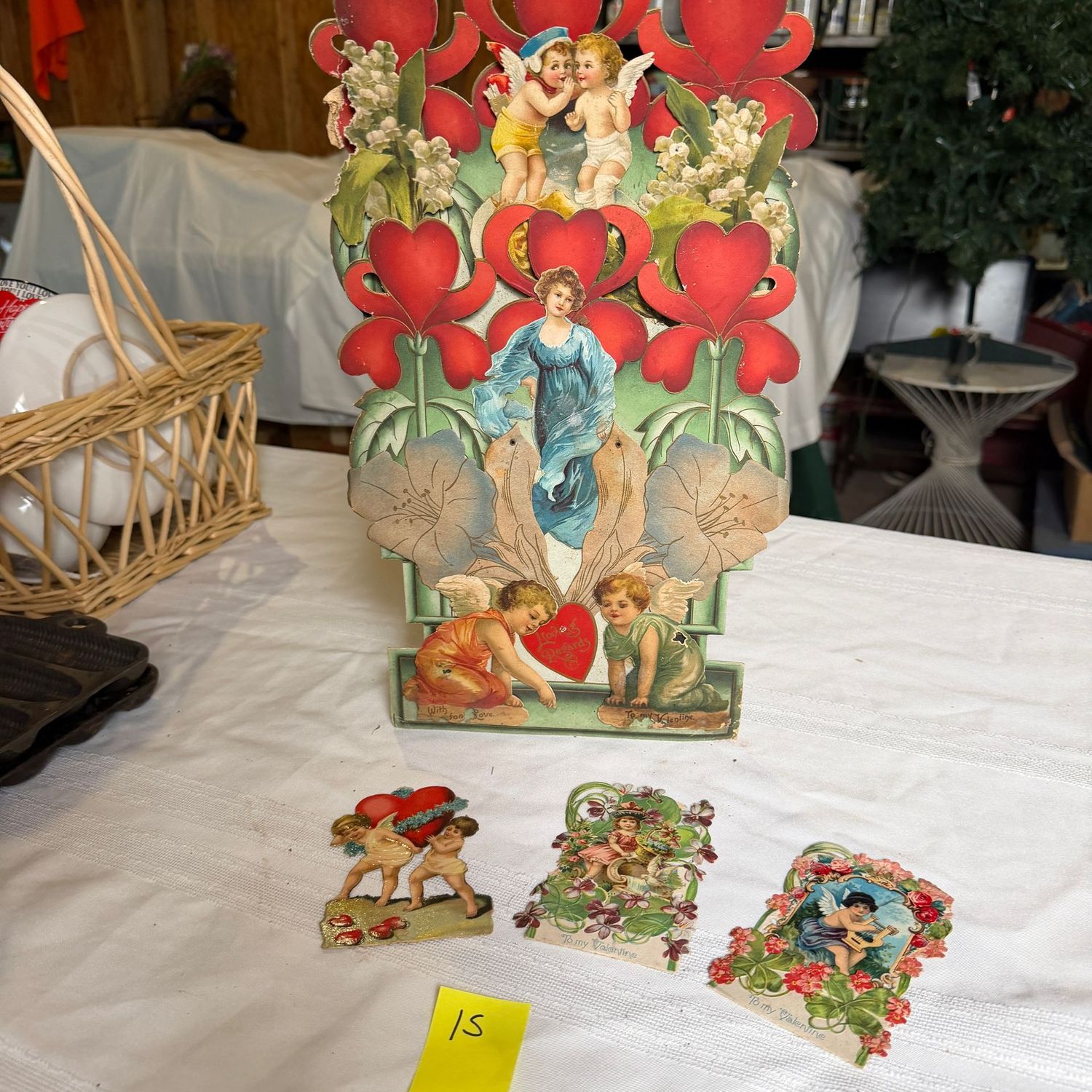 Lot #15, antique paper valentine decorations, the tallest is approx. 18 Lot #15, antique paper valentine decorations, the tallest is approx. 18"