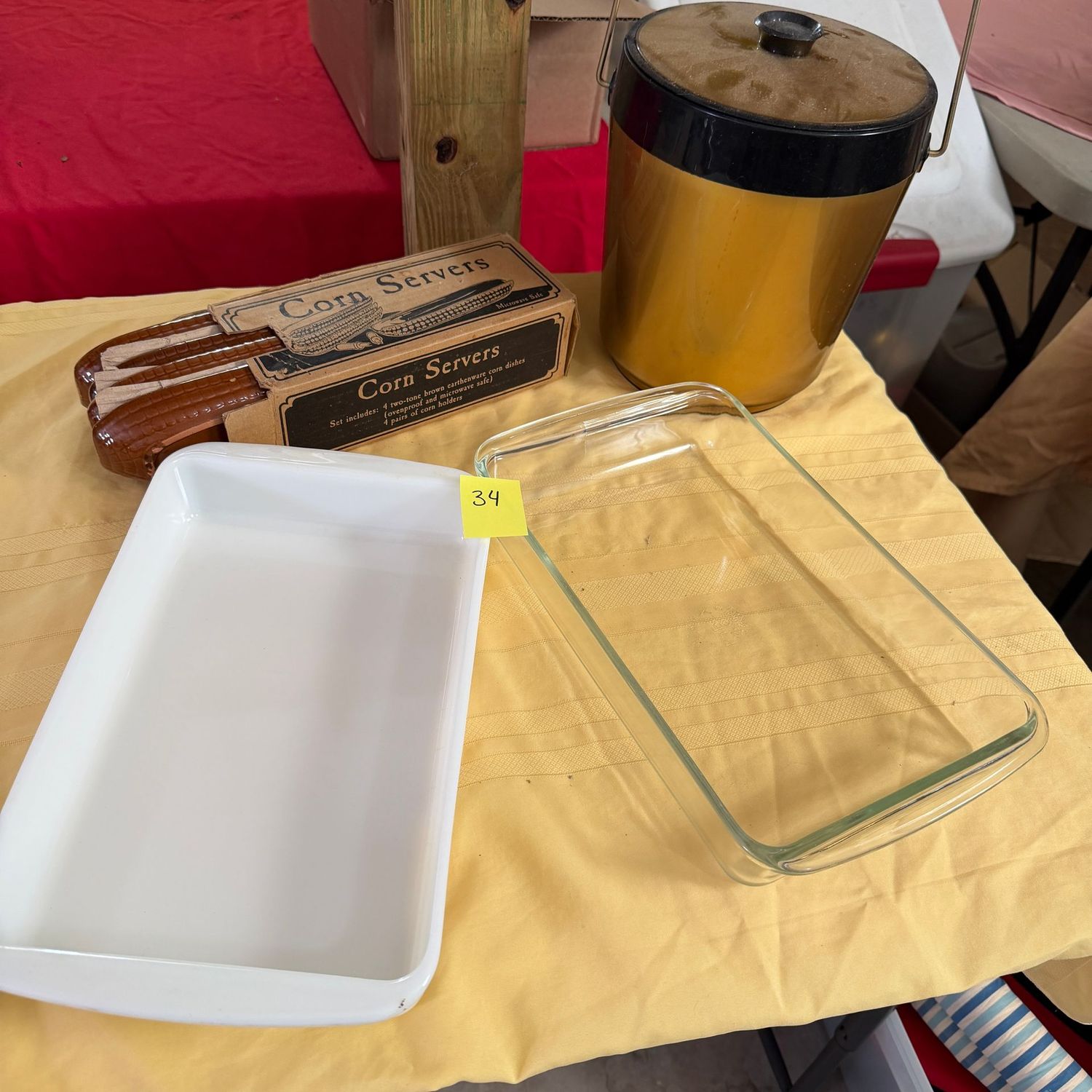 Lot #34, Pyrex 8x11 baking dishes, corn servers, ice bucket Lot #34, Pyrex 8x11 baking dishes, corn servers, ice bucket