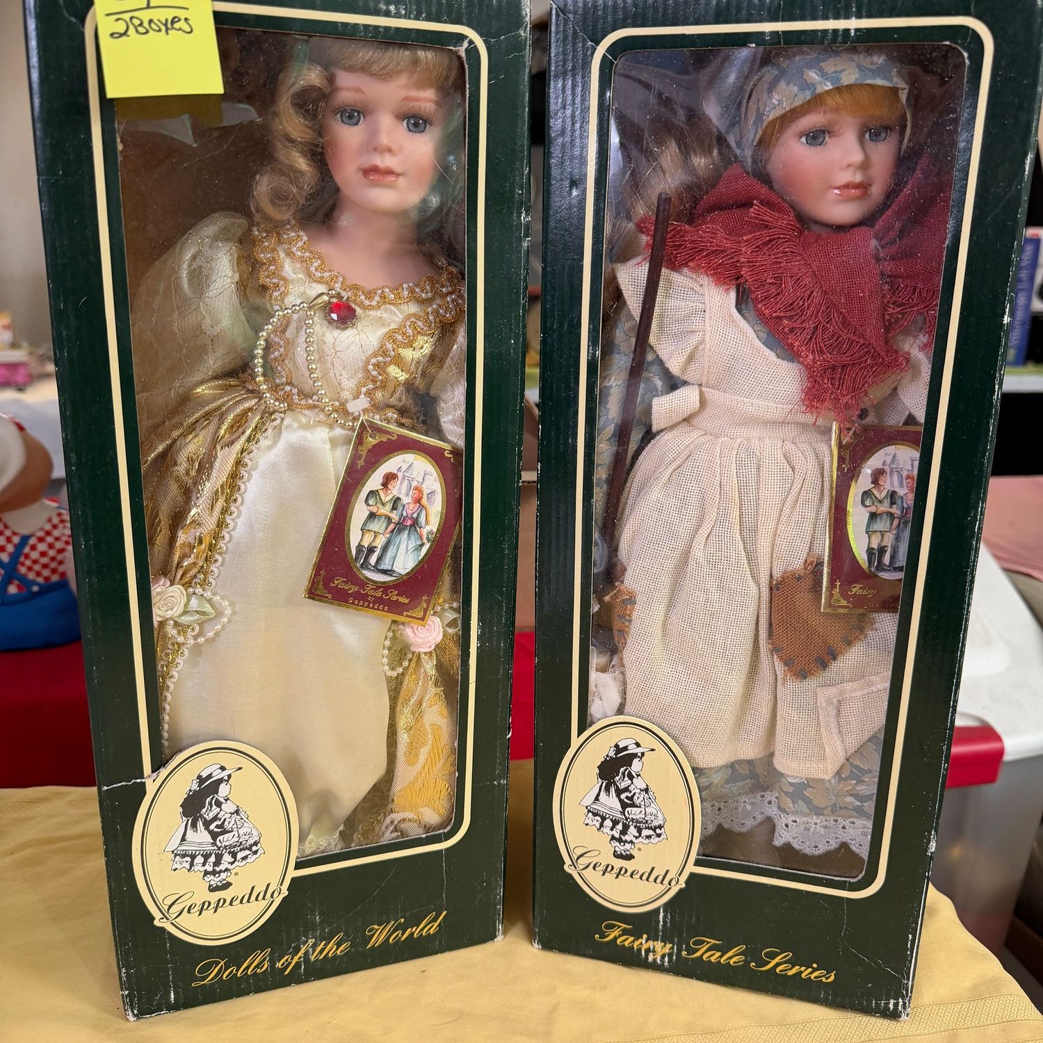 Lot #37, 2 boxes of Gepeddo porcelain dolls, 16 Lot #37, 2 boxes of Gepeddo porcelain dolls, 16"