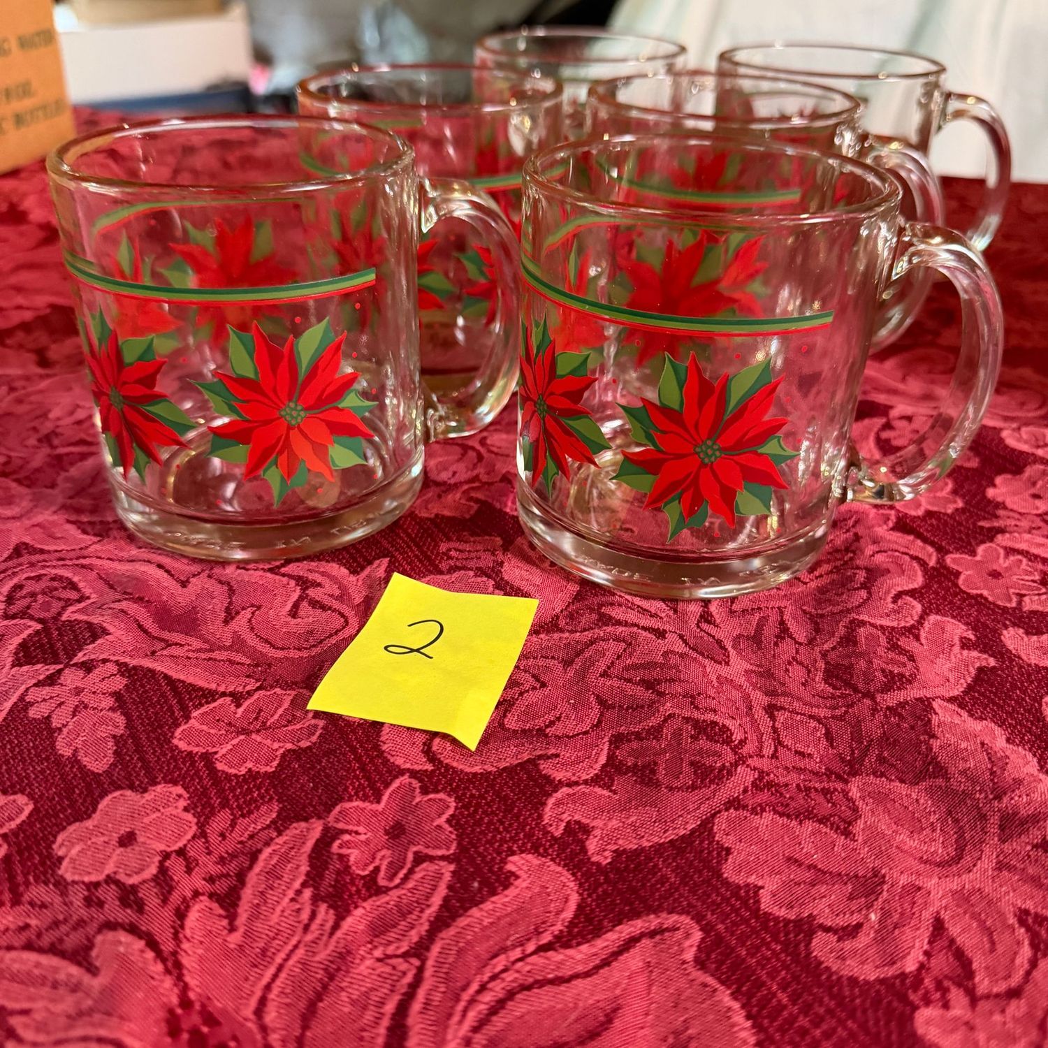 Lot #2, poinsettia clear glass mugs Lot #2, poinsettia clear glass mugs