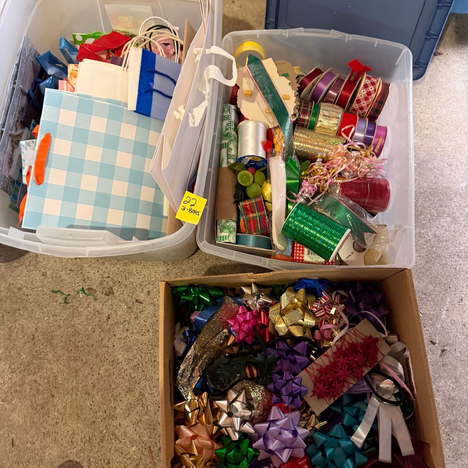 Lot #22, three boxes of gift wrap supplies