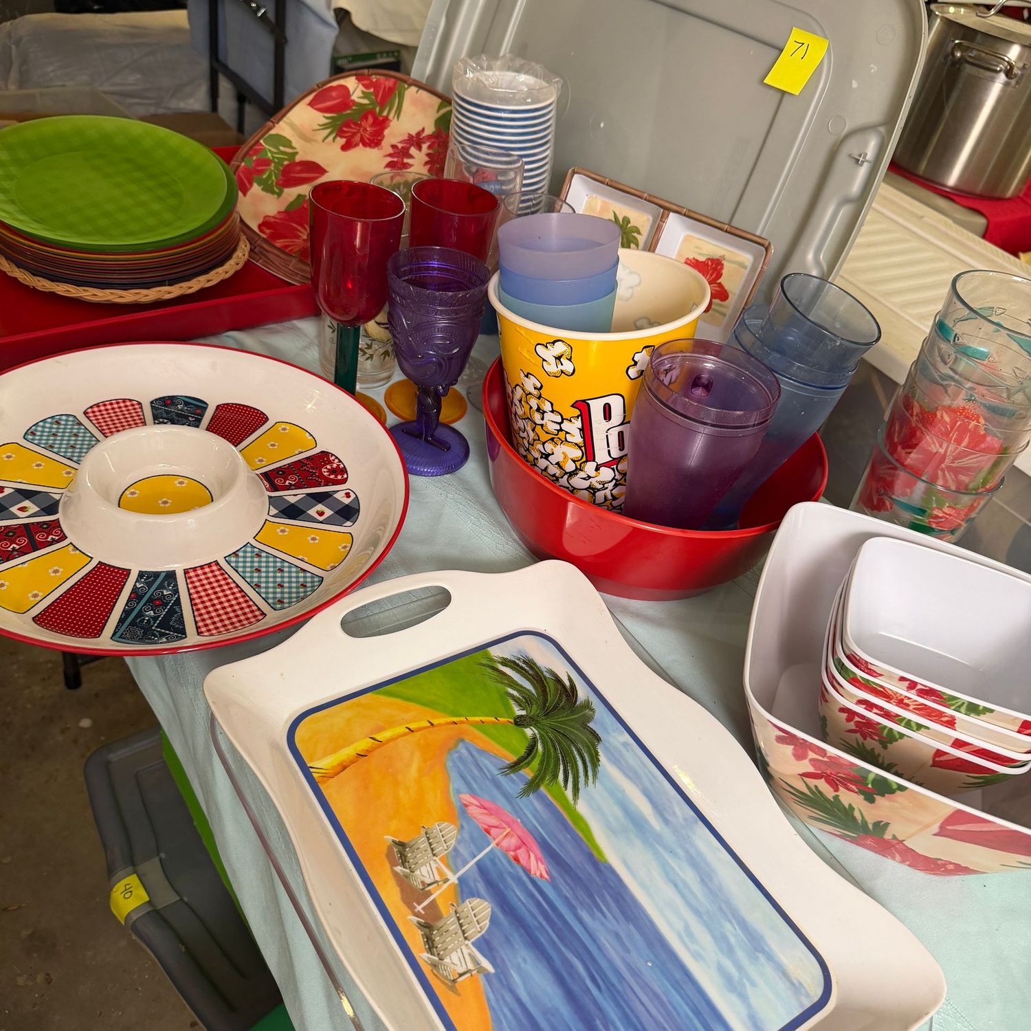 Lot #71, bin with picnicware, plastic cups, plates, trays, some have a little wear Lot #71, bin with picnicware, plastic cups, plates, trays, some have a little wear