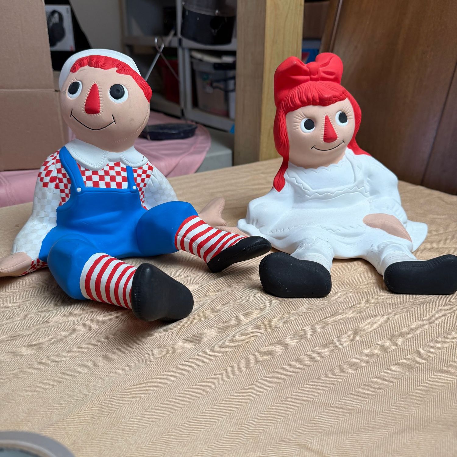 Ceramic Raggedy Ann and Andy figurines, seated height is 10 Ceramic Raggedy Ann and Andy figurines, seated height is 10"H