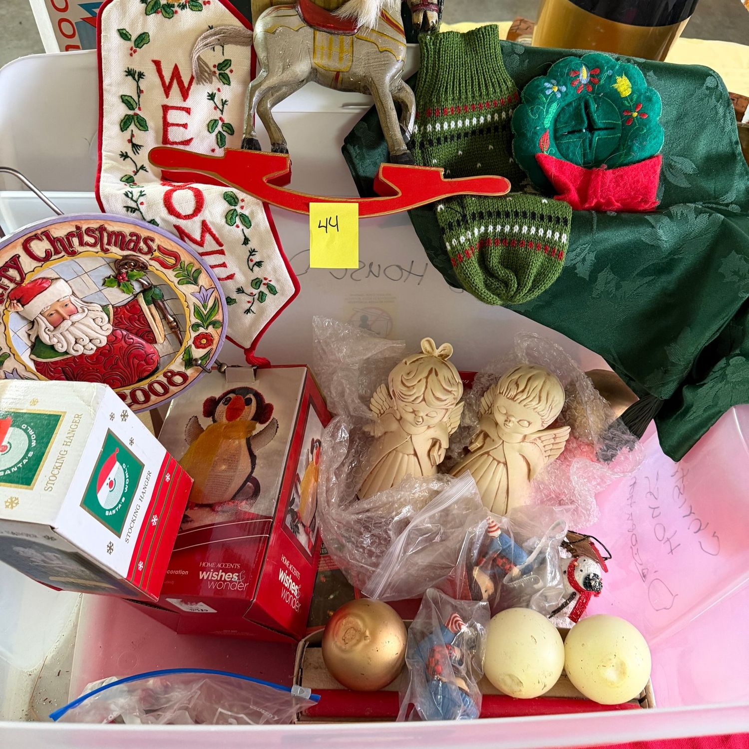 Lot #44, bin of Christmas decorations Shore Santa plate, rocking horse, & more Lot #44, bin of Christmas decorations Shore Santa plate, rocking horse, & more