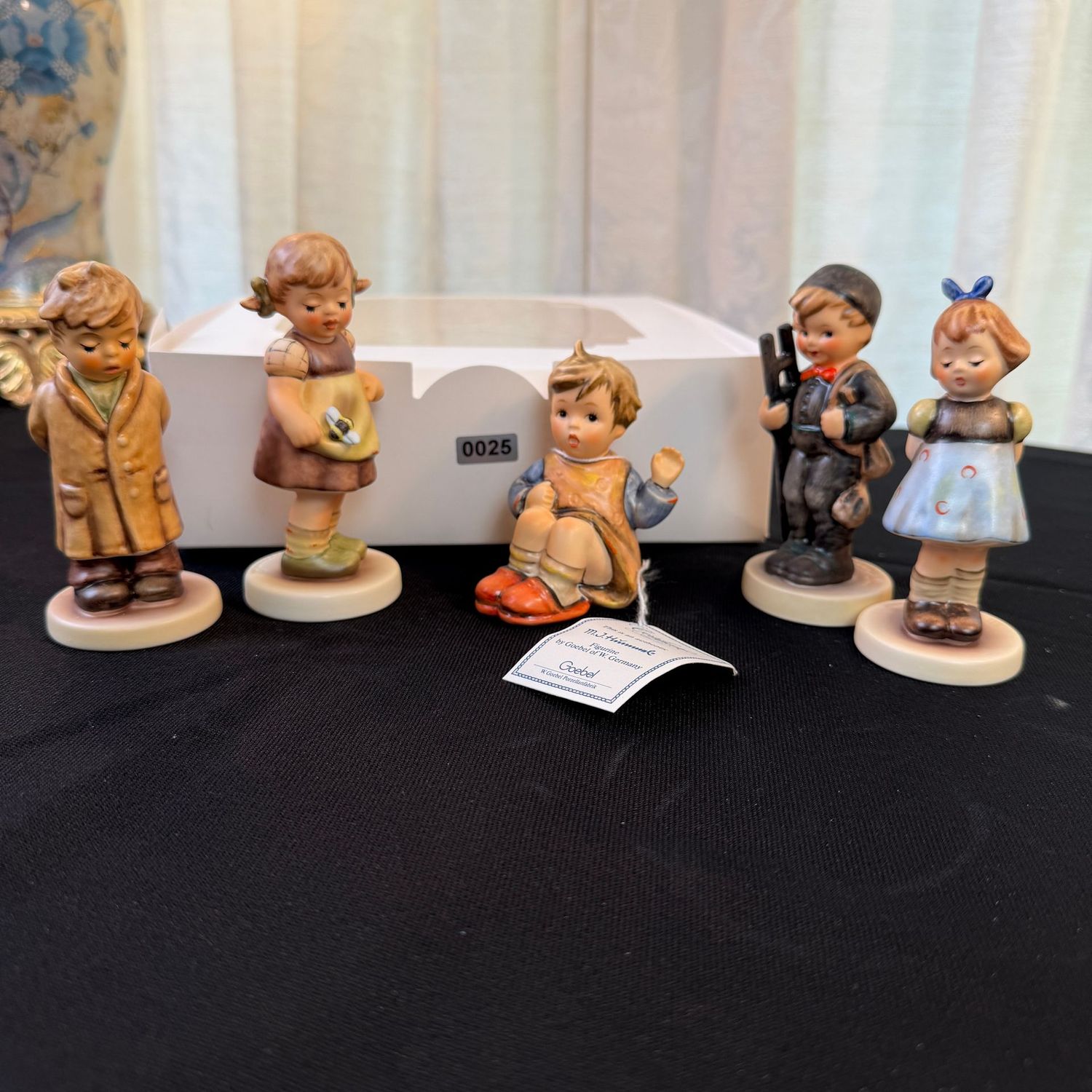 Group of 5 Hummel figurines, the tallest is 4.25 Group of 5 Hummel figurines, the tallest is 4.25"H, S0025