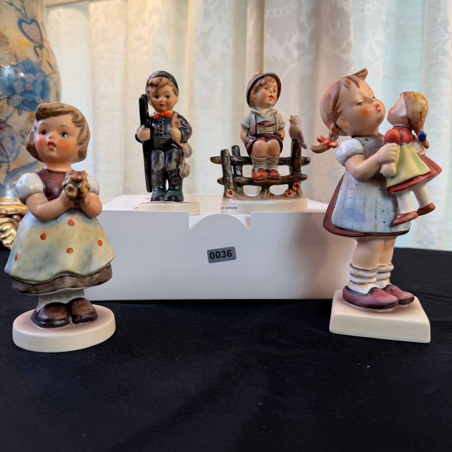 Four Hummel figurines, the tallest is 6", S0036