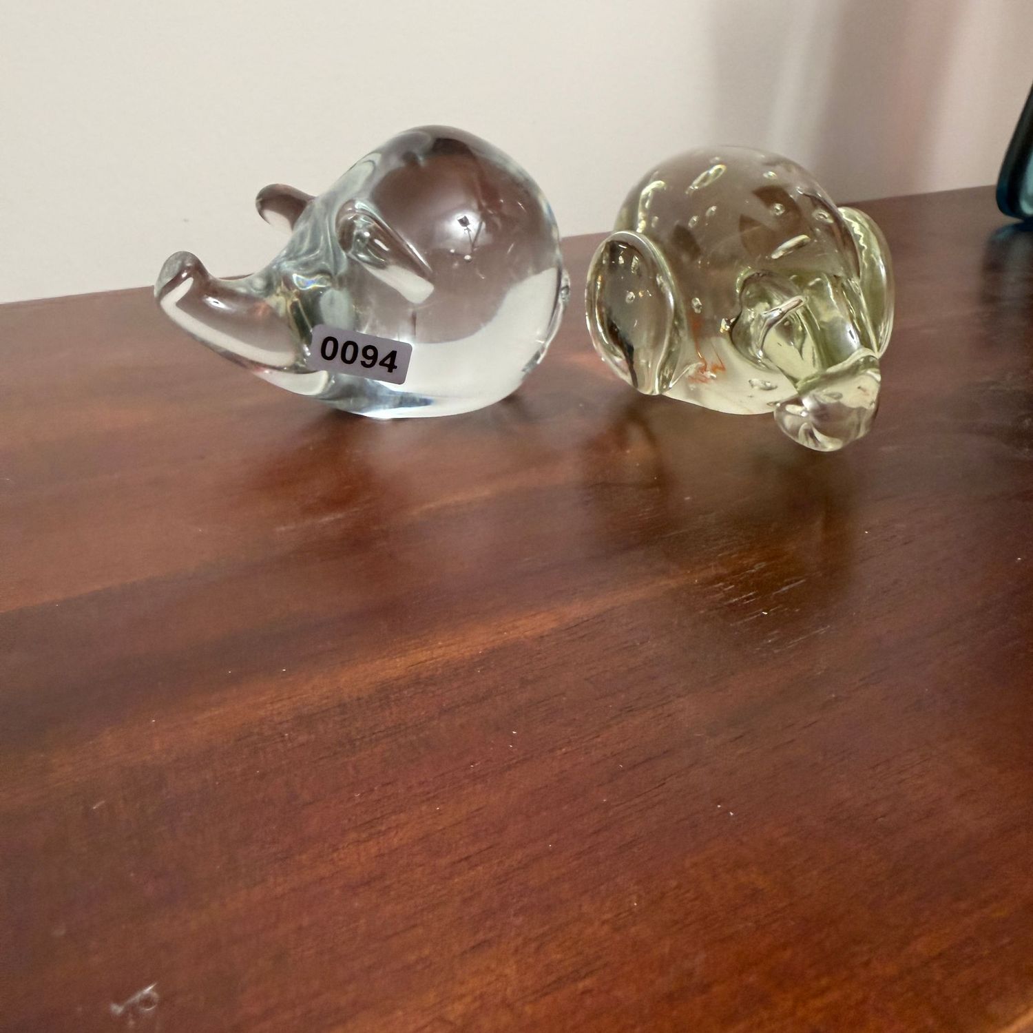 Two clear glass elephant paperweights, 2.5"L, S0094
