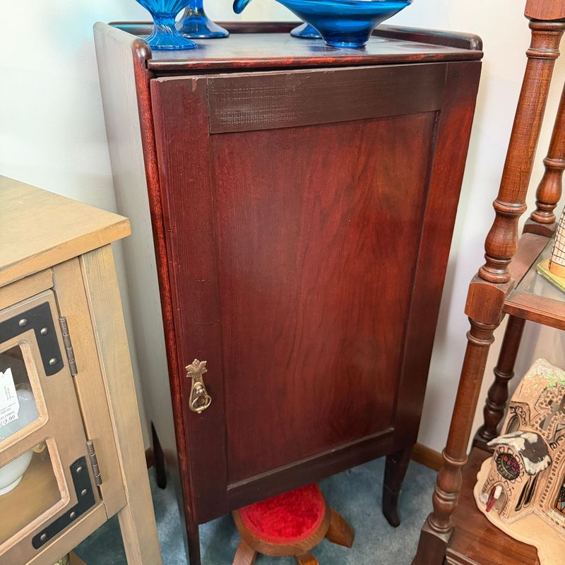 Mahogany music cabinet, brass pull, door top bows out slightly, lots of shelves, includes sheet music, 38" x 18"W x 13"D