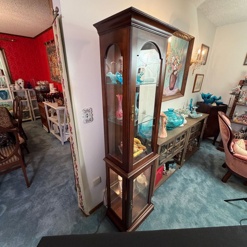 Slender lighted curio cabinet, nice condition, adjustable glass shelves, plate grooves, 5'10"H x 13"D x 19"W