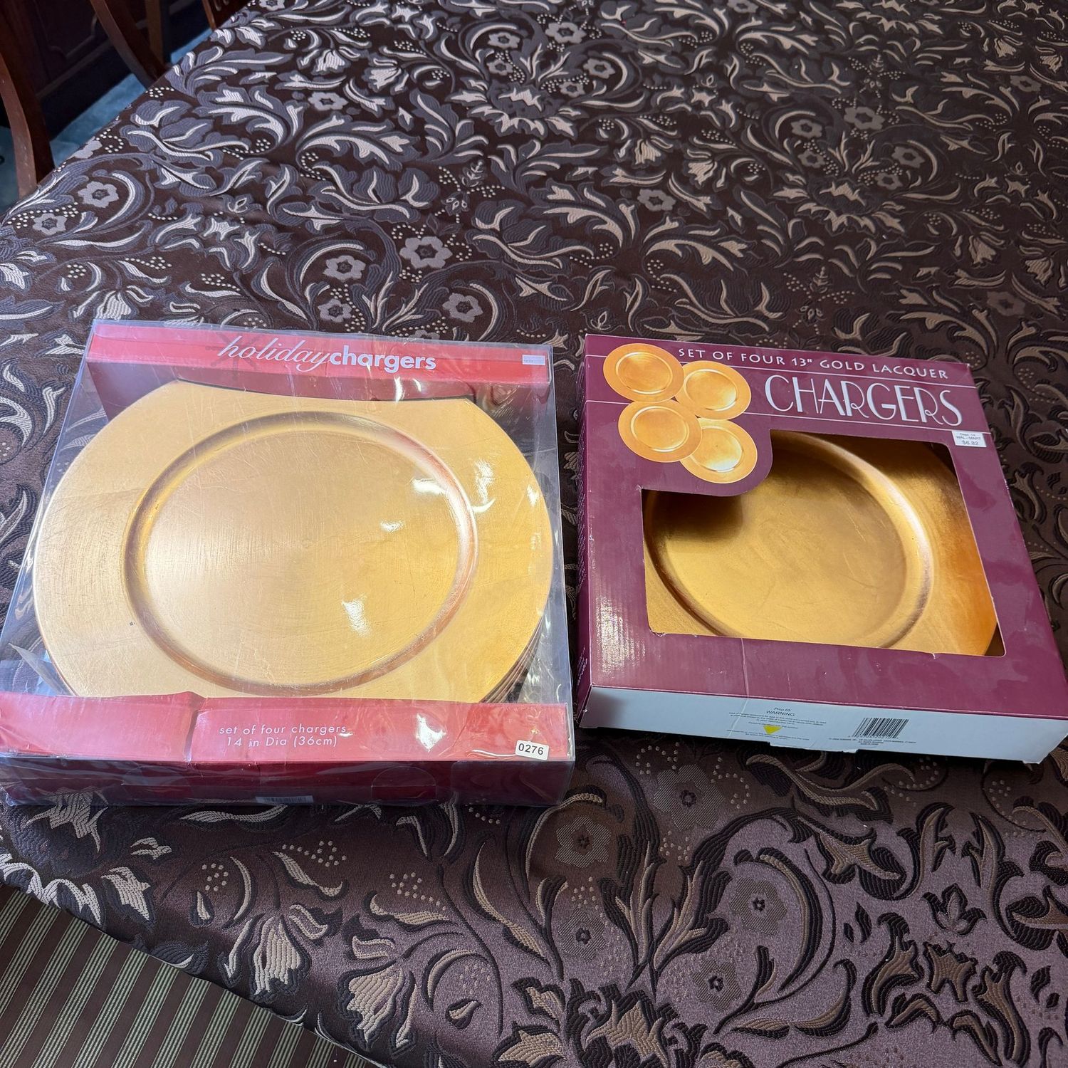 Two sets of 4 (8 total) gold plastic chargers, 14 Two sets of 4 (8 total) gold plastic chargers, 14" and 13", S0276