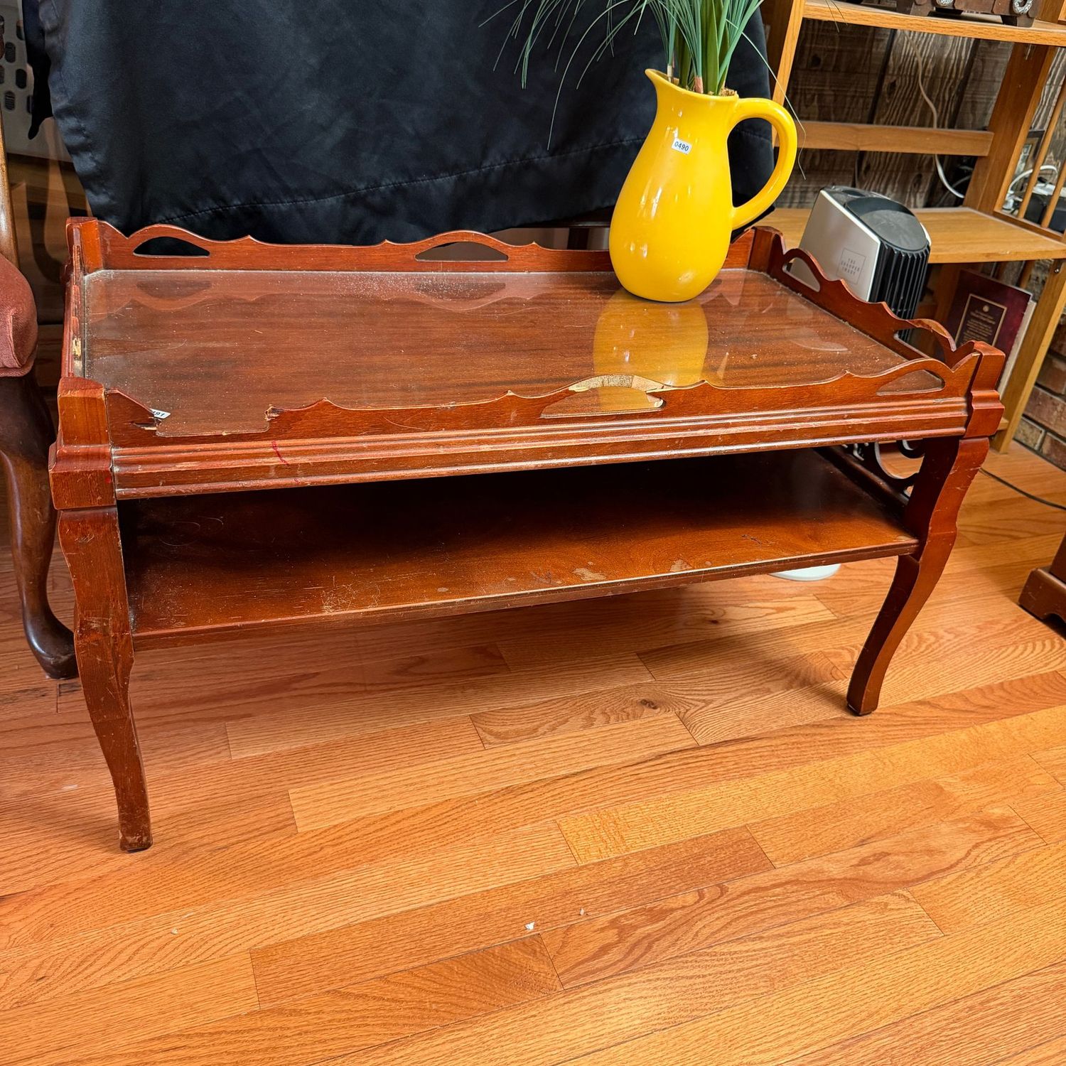 Vintage Mahogany coffee table ready for refurbishing, has a custom glass top, some border has been broken, 18"H x 18"W x 34"L, S0491