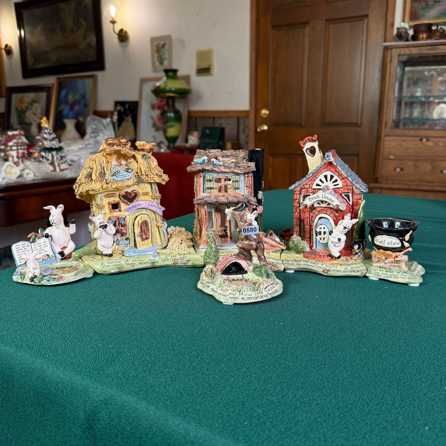 Blue Sky Clayworks Three Little Pigs 6-piece set, the buildings are 6 Blue Sky Clayworks Three Little Pigs 6-piece set, the buildings are 6"H, as seen is 19"W, comes with triple-light cord, S0580