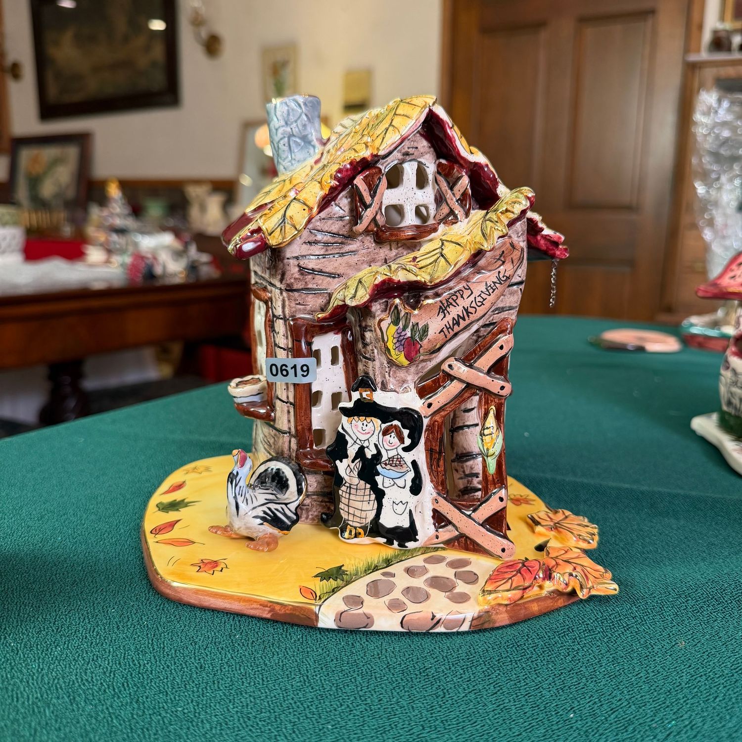 Blue Sky Clayworks S0619, Happy Thanksgiving house with pilgrims, turkey's chain needs minor link repair, 7 Blue Sky Clayworks S0619, Happy Thanksgiving house with pilgrims, turkey's chain needs minor link repair, 7"H
