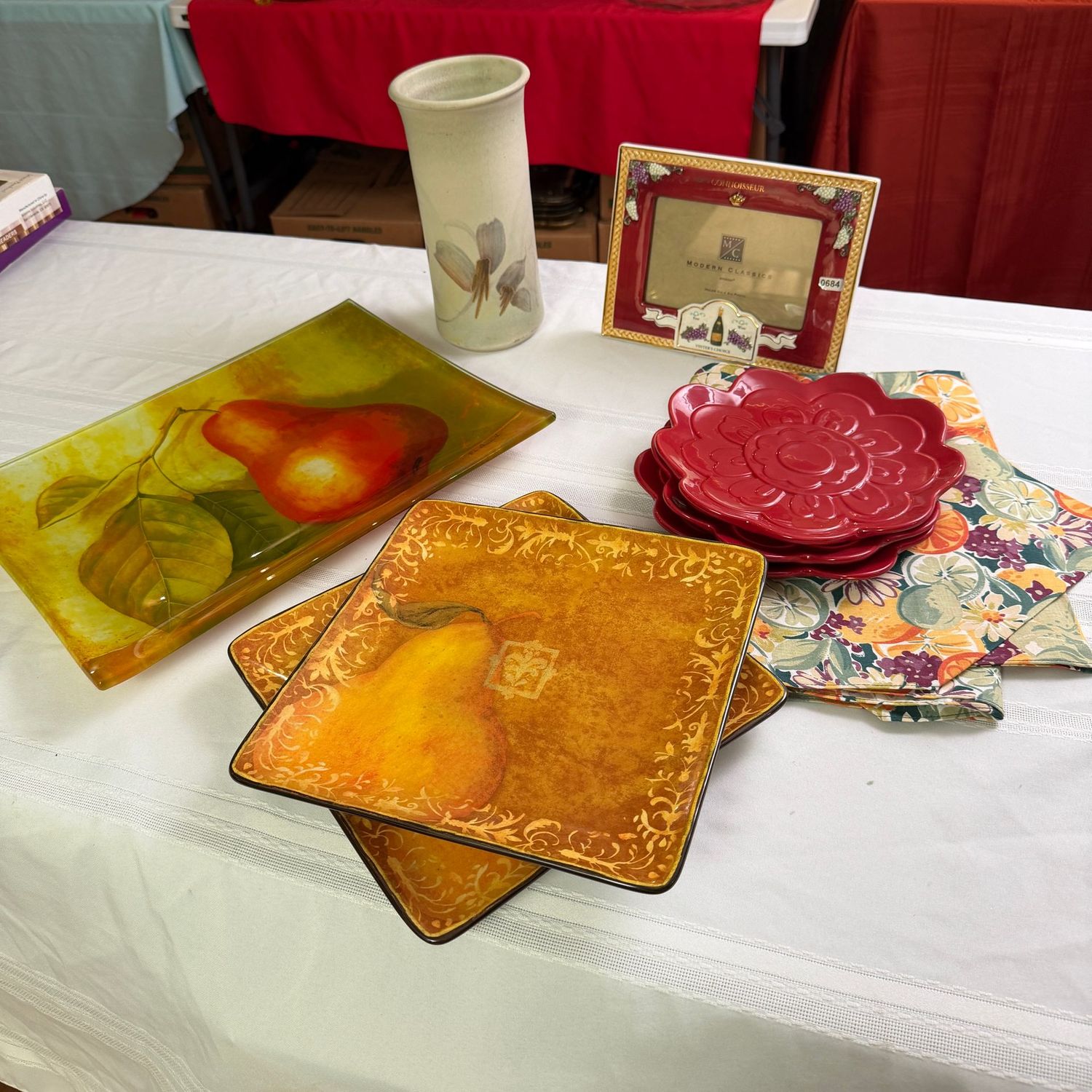 Fall serving grouping with runner, ceramic dishes, wine bottle cooler, frame, and large 15"L glass pear platter, S0684