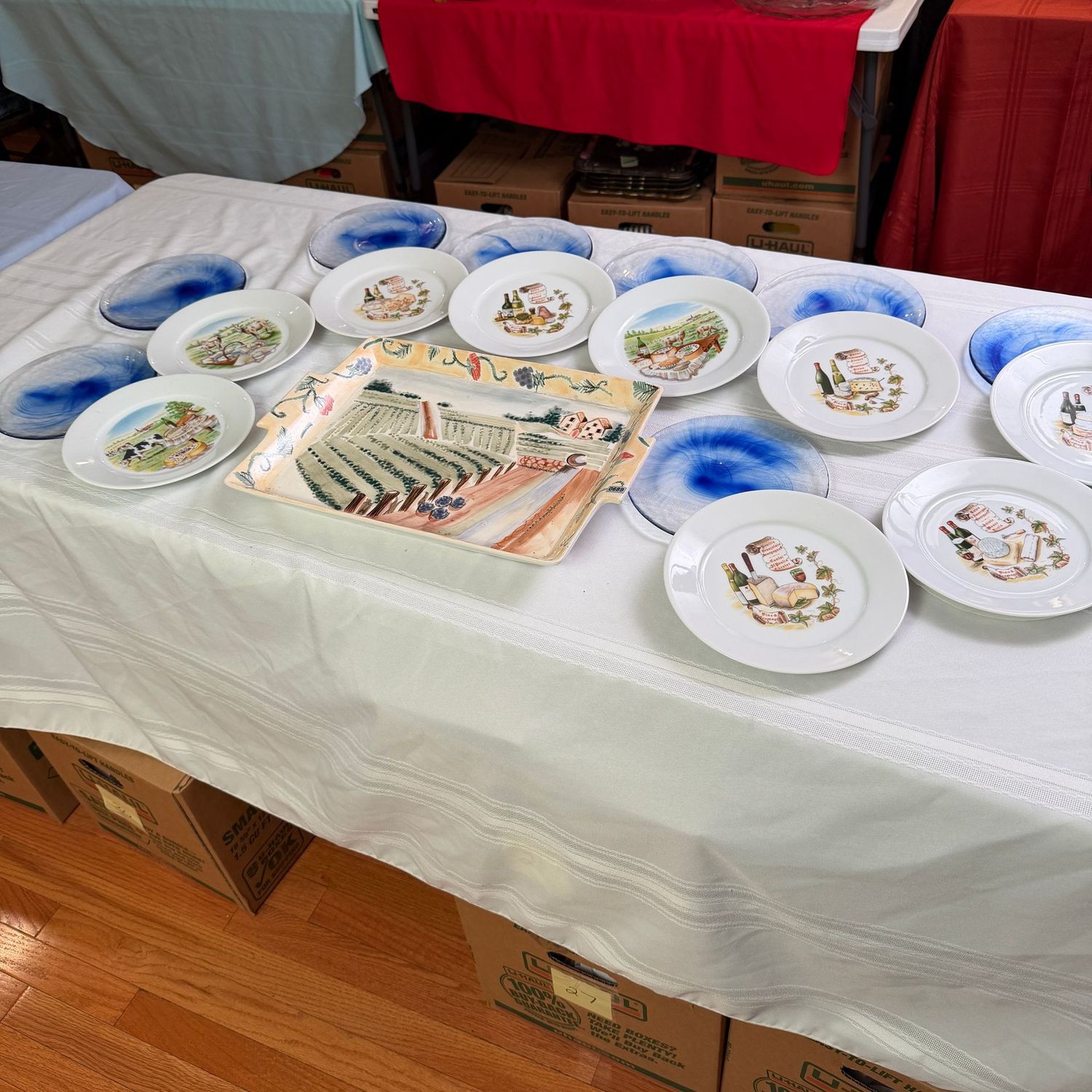 Swirled blue glass dessert plates, and wine & cheese plates with 16 Swirled blue glass dessert plates, and wine & cheese plates with 16"L ceramic tray, S0689