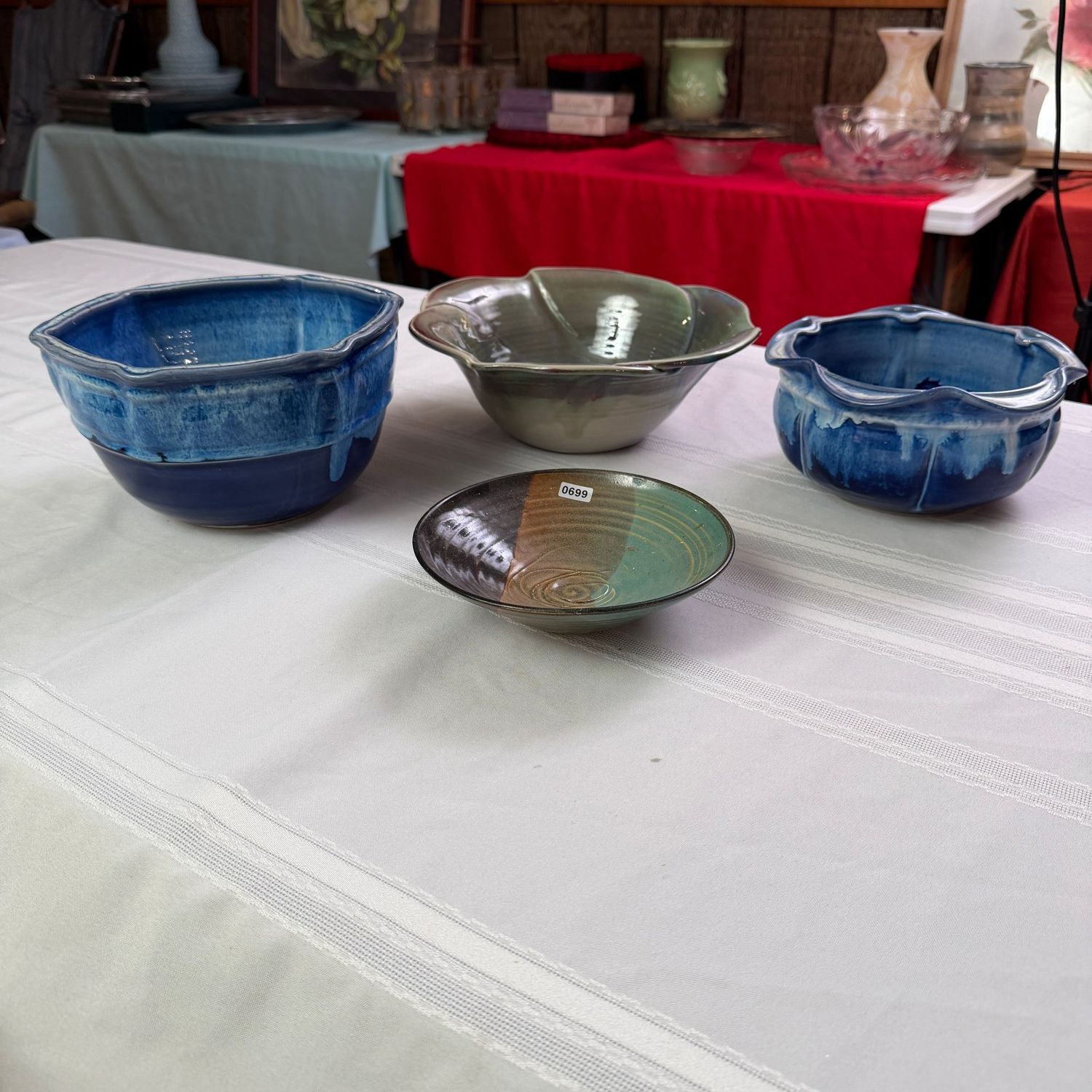 Beautiful collection of Floe Pottery, blues and earthy greens, the widest piece is 10 Beautiful collection of Floe Pottery, blues and earthy greens, the widest piece is 10", S0699