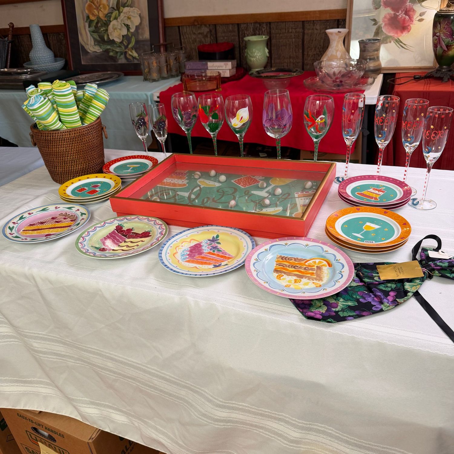 Let's celebrate grouping with cake plates, painted stemware, napkins, drink cooler, 20 Let's celebrate grouping with cake plates, painted stemware, napkins, drink cooler, 20"L game/serving tray, S0688