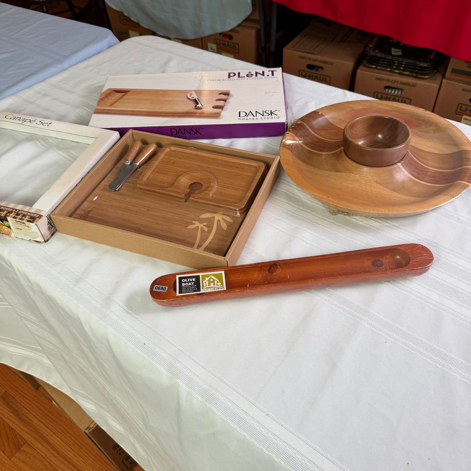 Dansk cheese board with knives, canape set, olive boat, and 13 Dansk cheese board with knives, canape set, olive boat, and 13"W round wooden platter with dip bowl, S0690