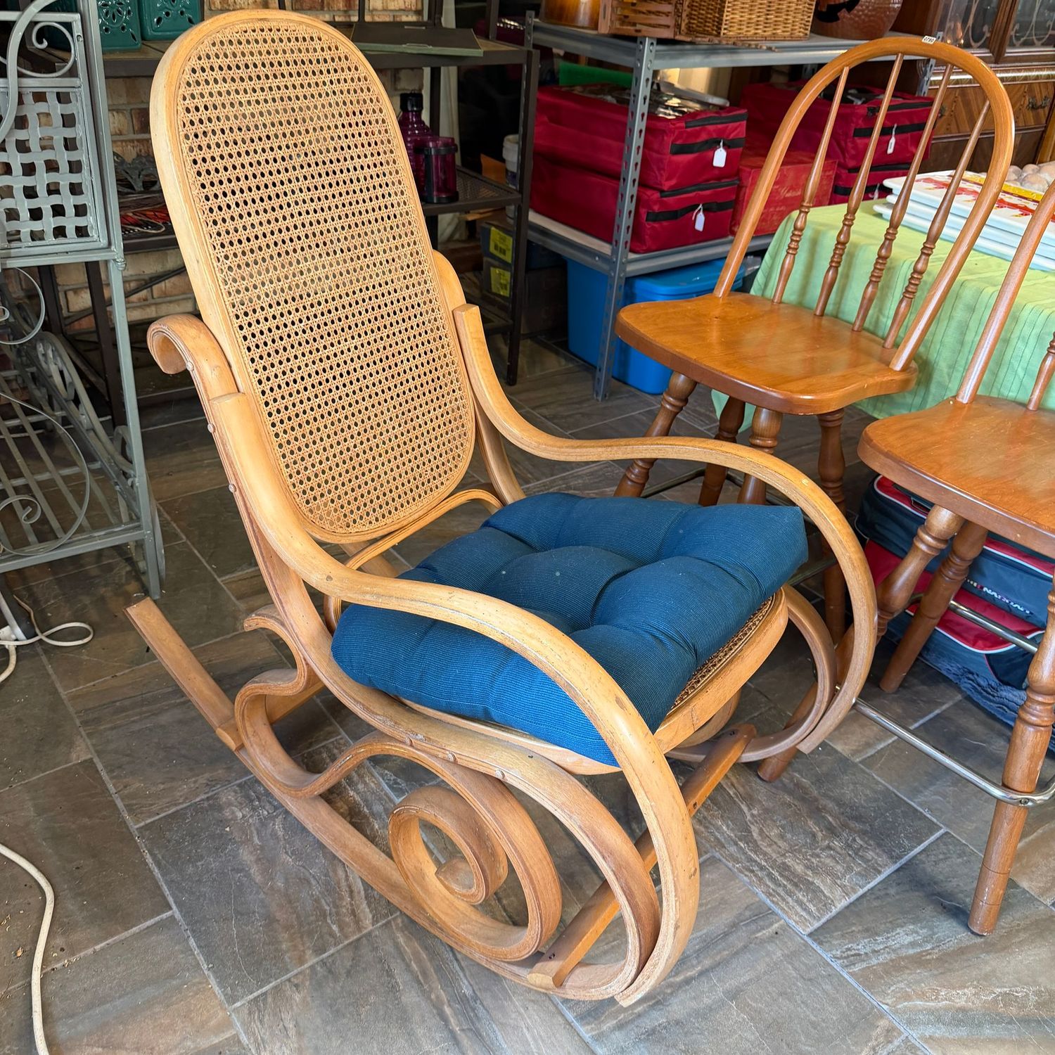 Bentwood rocker with cane seat and back, some fading to finish, 40"H x 22"W