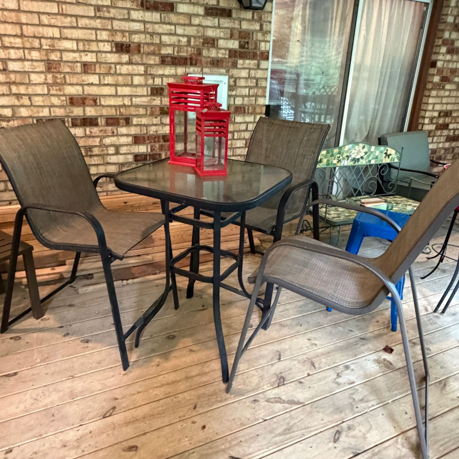 Bistro table 36 Bistro table 36"H x 26"W with two black chairs, and 1 dark grey S0916