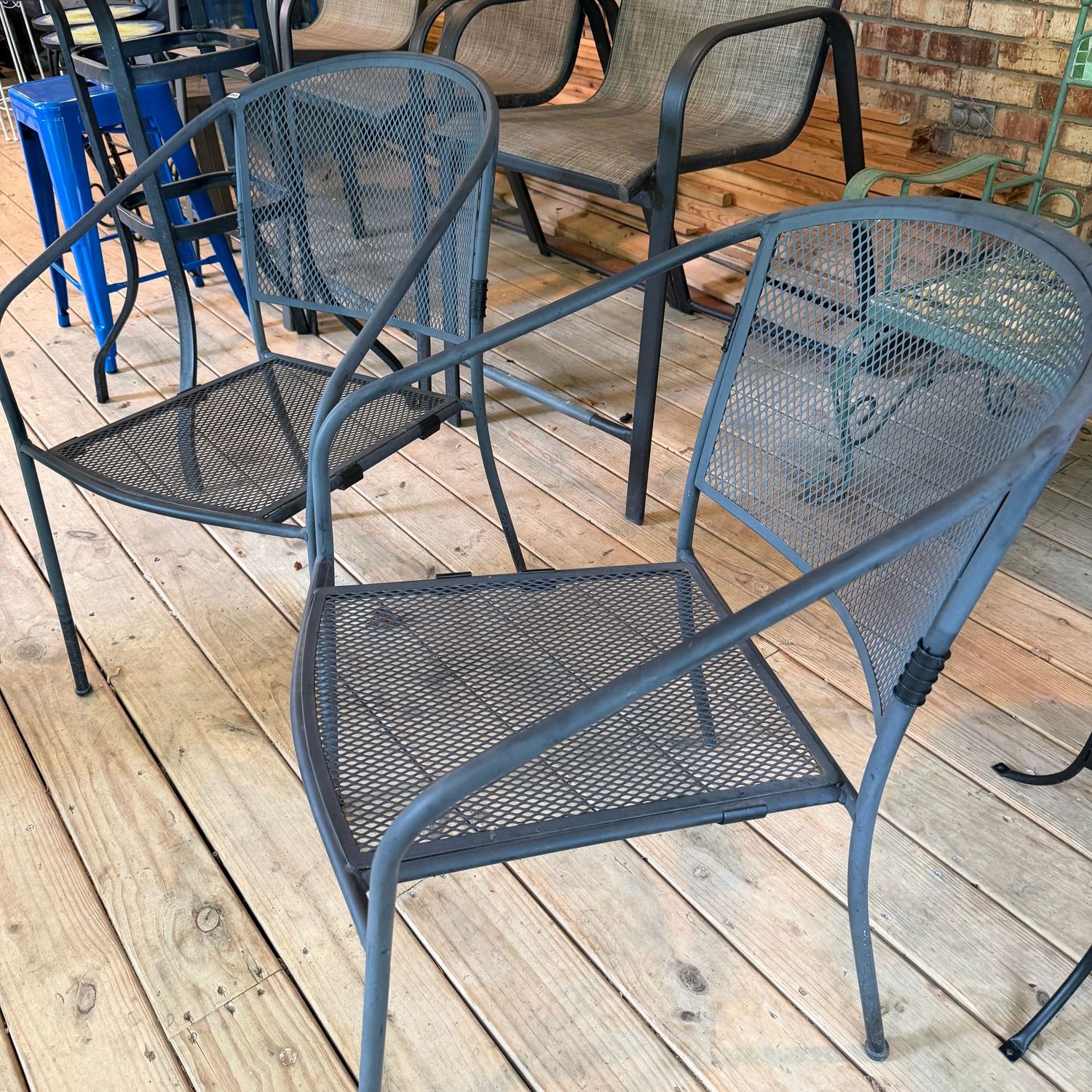 Pair of metal mesh patio chairs, stackable, comes with a cushion for seat or back, some fading, 30 Pair of metal mesh patio chairs, stackable, comes with a cushion for seat or back, some fading, 30"H x 22"W, S0966