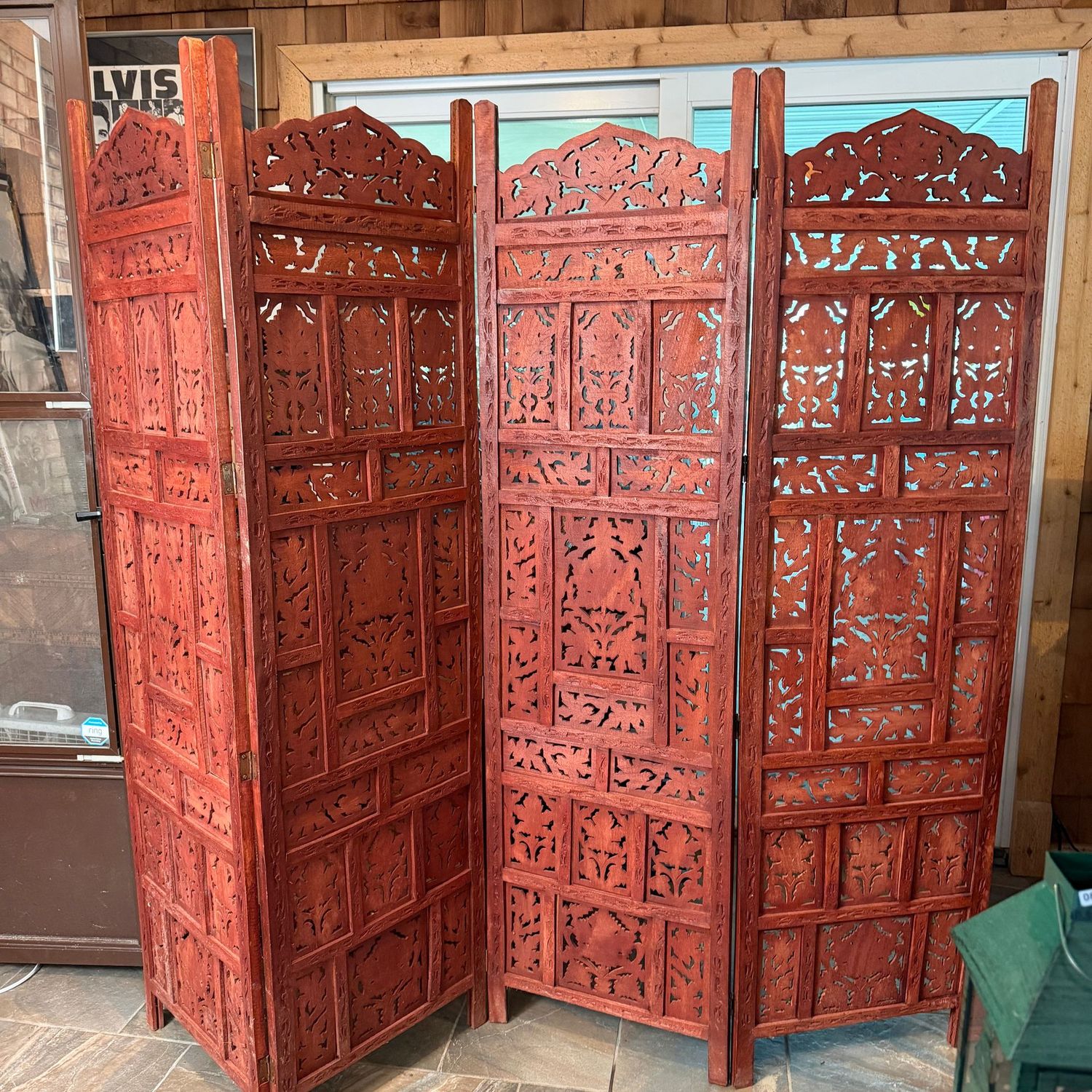 Large carved teak room divider, very heavy, top panels do slide out, each panel is 5'10 Large carved teak room divider, very heavy, top panels do slide out, each panel is 5'10"H x 19"W, folded as seen, will cover a length of 66" comfortably