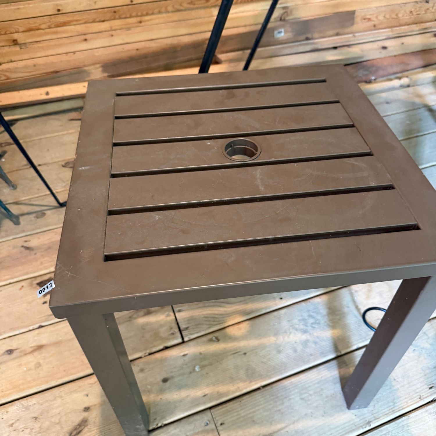 Tubular brown metal patio side table, some wear, 17 Tubular brown metal patio side table, some wear, 17"H x 16"W, S0913