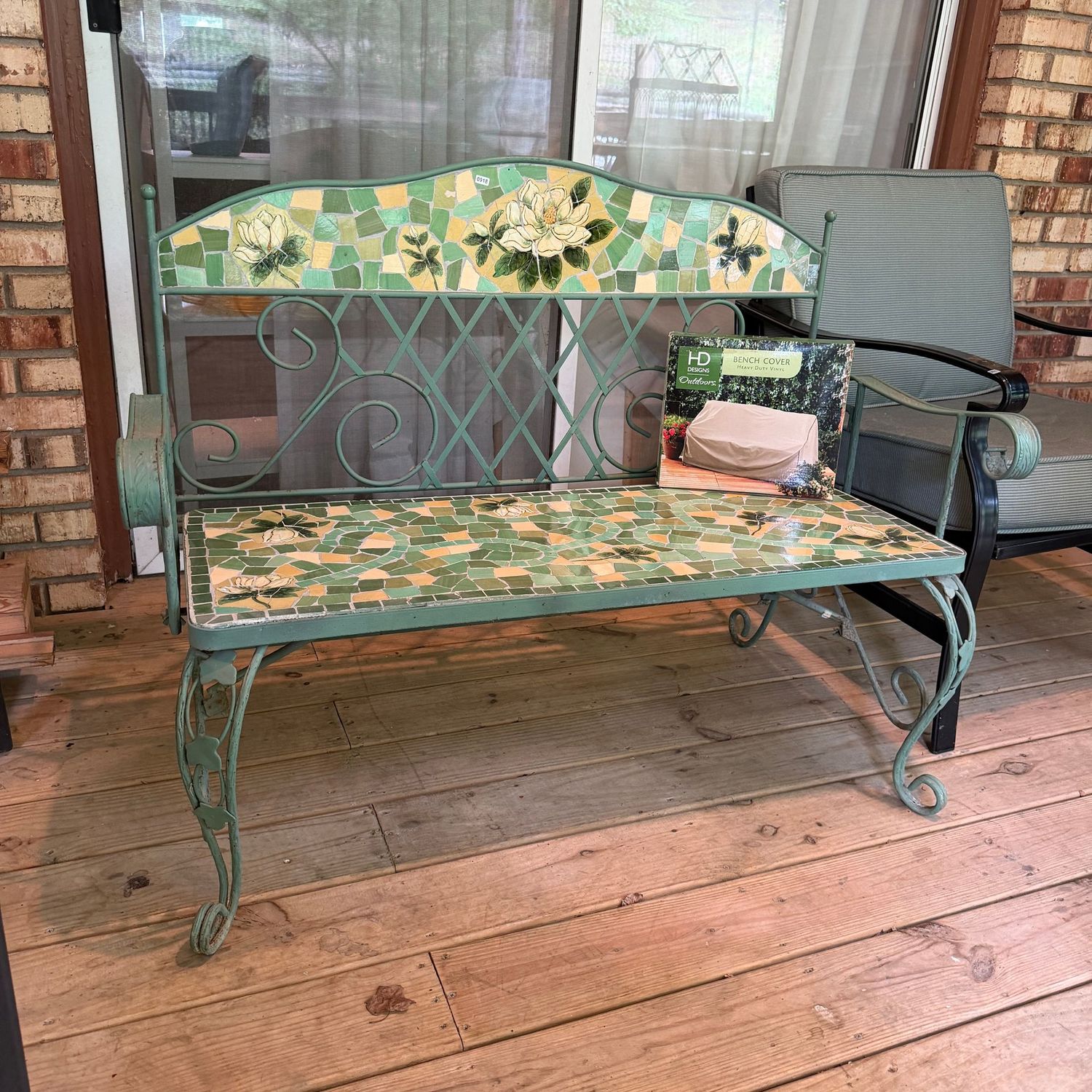 Vintage-style green patio/garden loveseat, has some minor wear to metal finish, floral tile back and seat appear in very nice condition, comes with a cover, 31 Vintage-style green patio/garden loveseat, has some minor wear to metal finish, floral tile back and seat appear in very nice condition, comes with a cover, 31"H x 43"W, very heavy, S0918