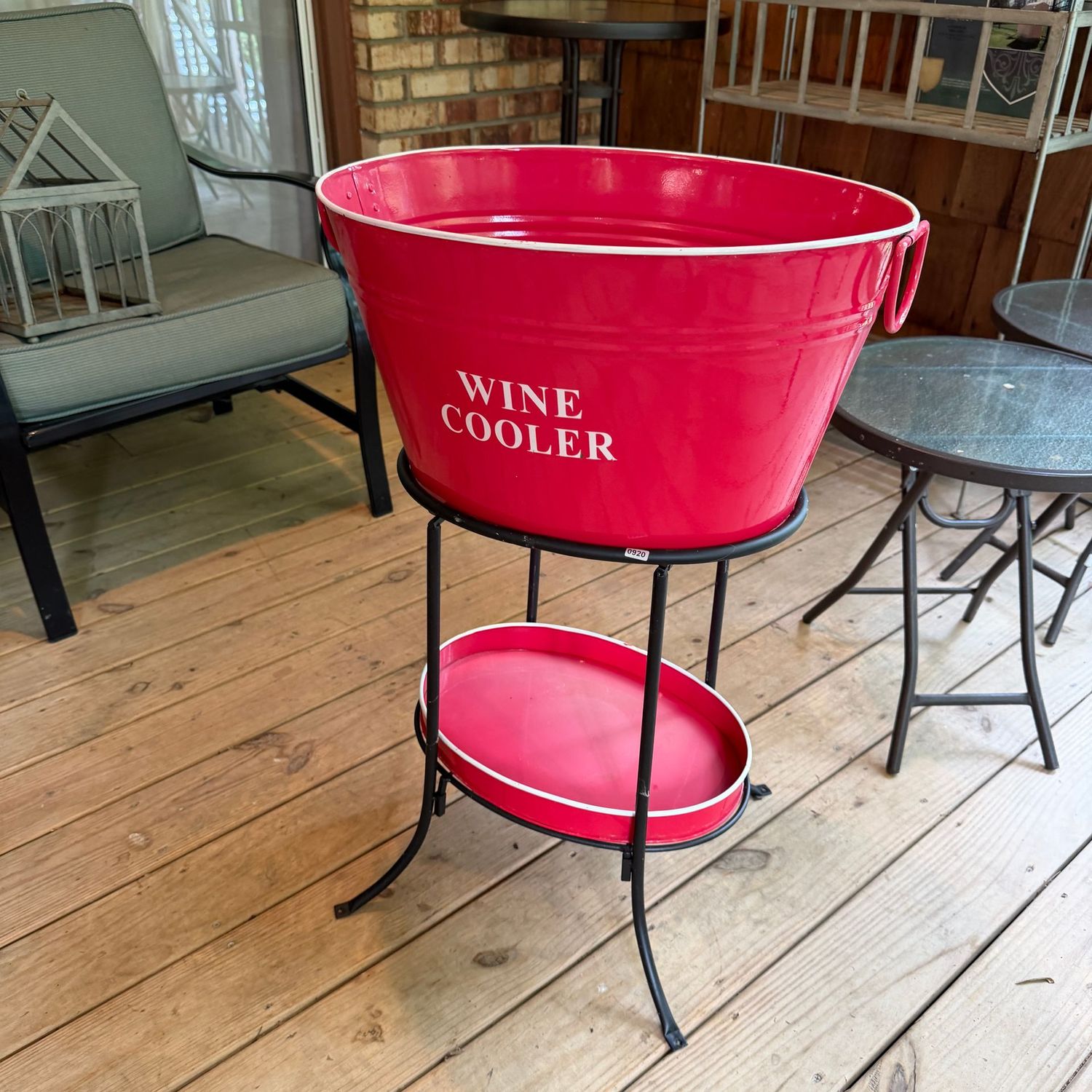 Red patio wine cooler oval metal bucket and tray on black metal stand, minor sun fading 32 Red patio wine cooler oval metal bucket and tray on black metal stand, minor sun fading 32"H x 20"L, S0920