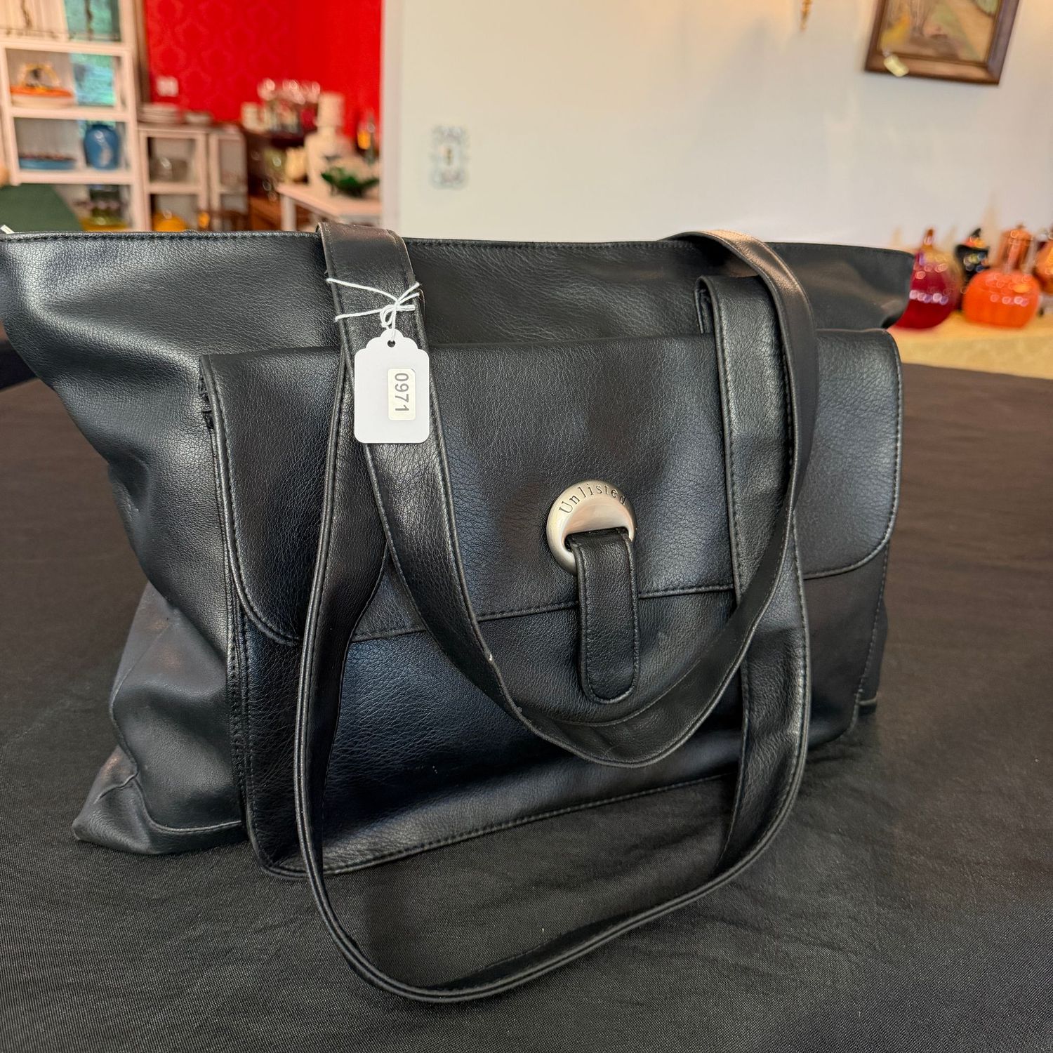 Black leather Kenneth Cole Unlimited purse, 16" x 12", nice condition, S0971