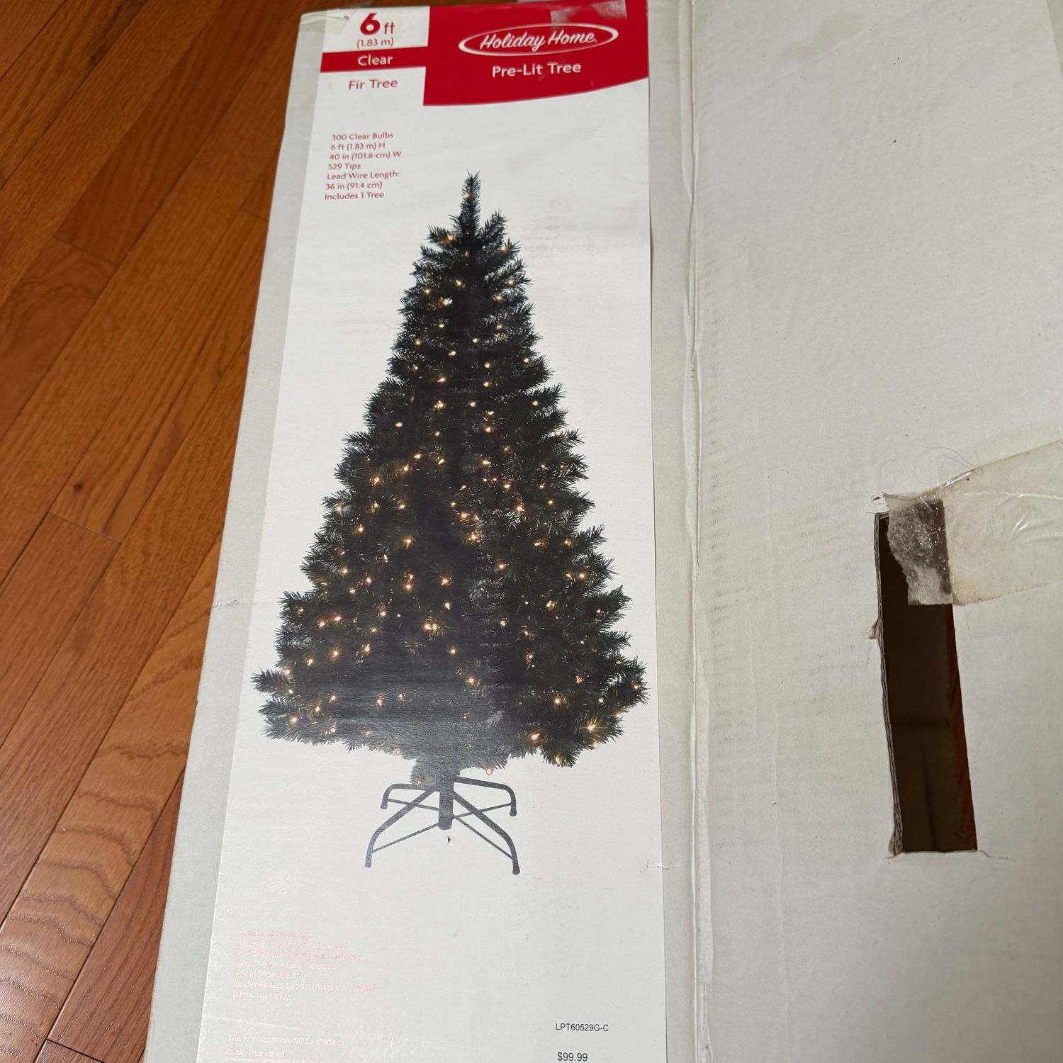 Holiday Home pre-lit clear bulb 6' fir tree, 40 Holiday Home pre-lit clear bulb 6' fir tree, 40"2, in box, works on initial test, S0993