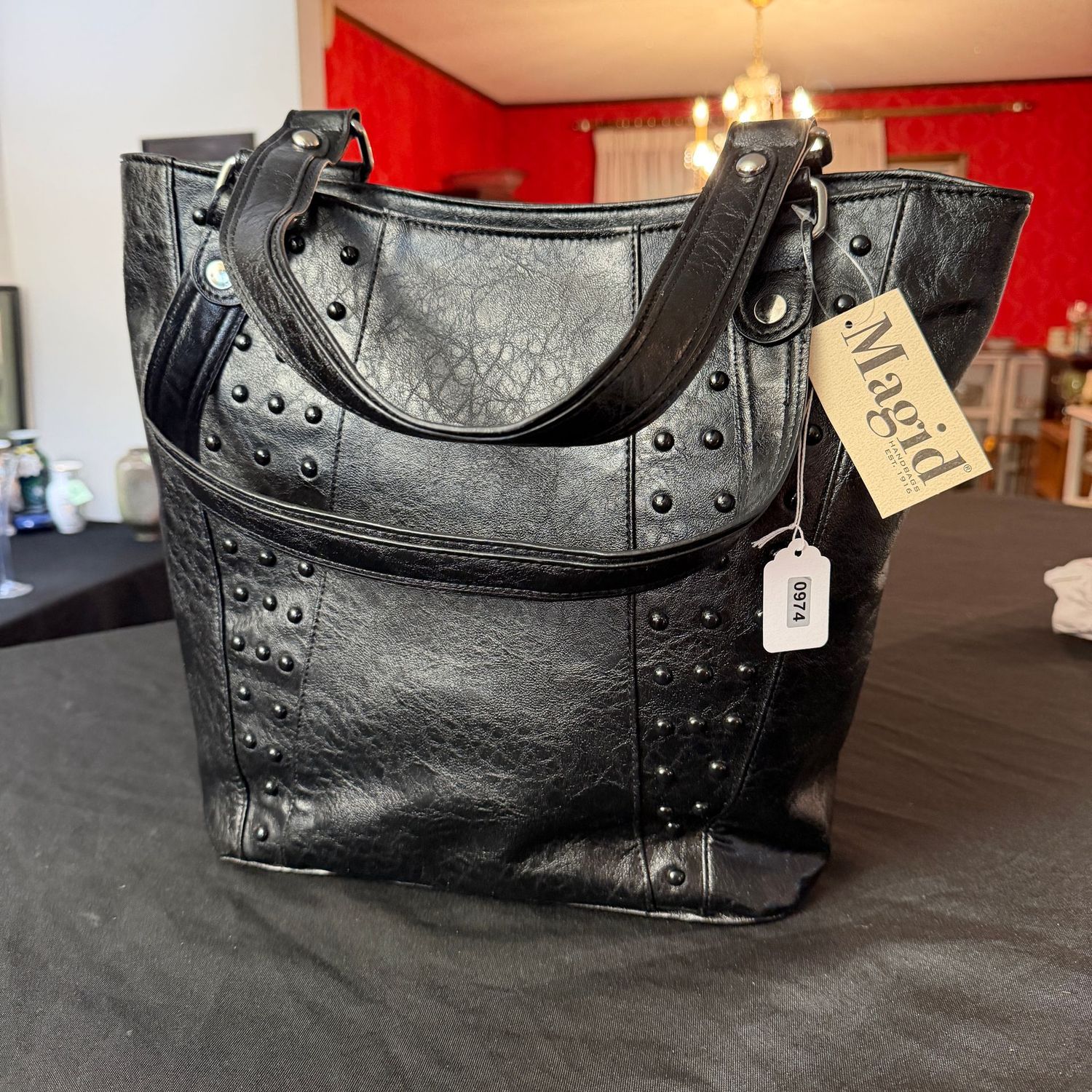 Magid black leather purse, new condition, 14 Magid black leather purse, new condition, 14" x 12", S0974