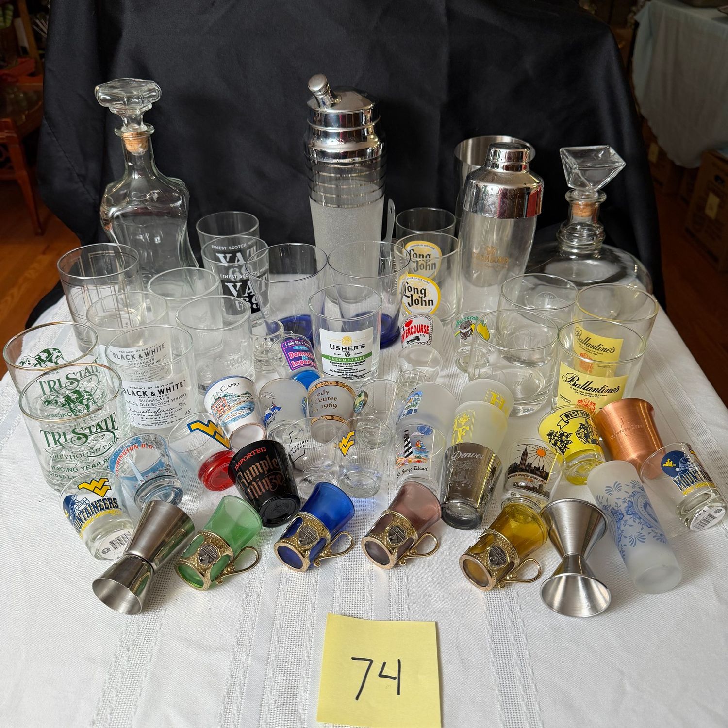 Box Lot (wrapped) 74 highball and shots, with decanters, and shakers Box Lot (wrapped) 74 highball and shots, with decanters, and shakers