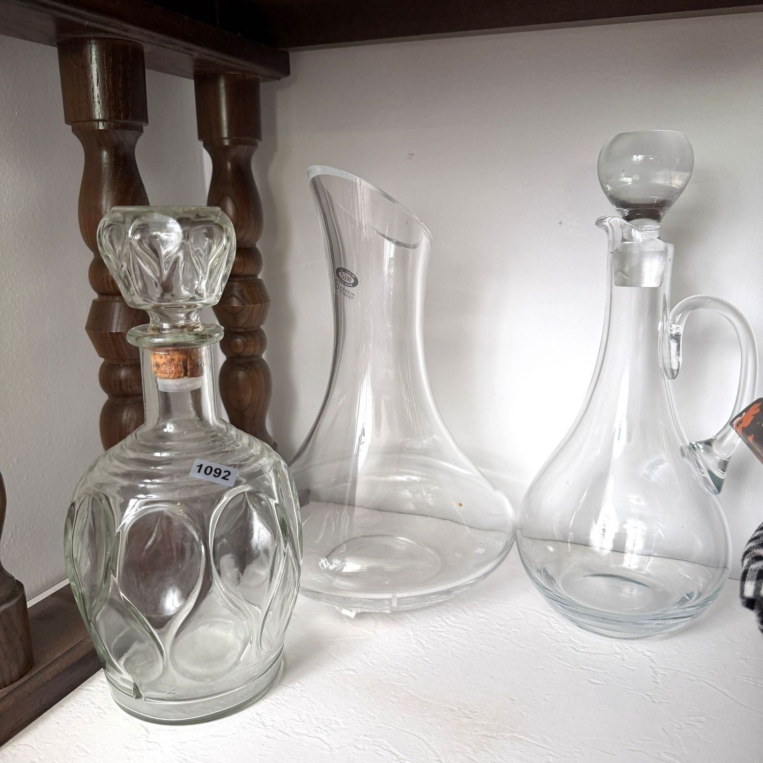 Trio of clear glass decanters, the tallest is 11 Trio of clear glass decanters, the tallest is 11", S1092