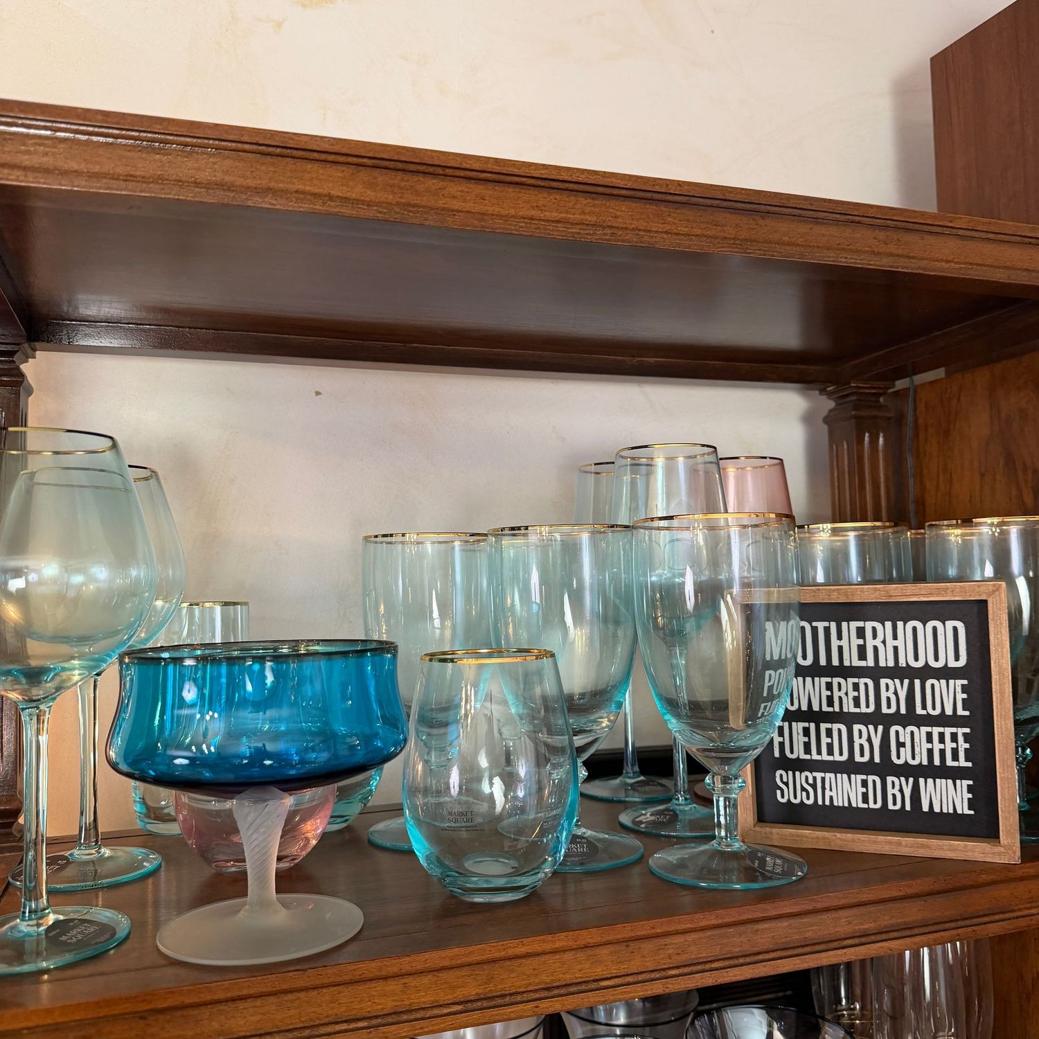 Mostly the 'blues' stemware with gold rims, a variety of sizes, a few pink, plus compote and motherhood plaque, S1111 Mostly the 'blues' stemware with gold rims, a variety of sizes, a few pink, plus compote and motherhood plaque, S1111