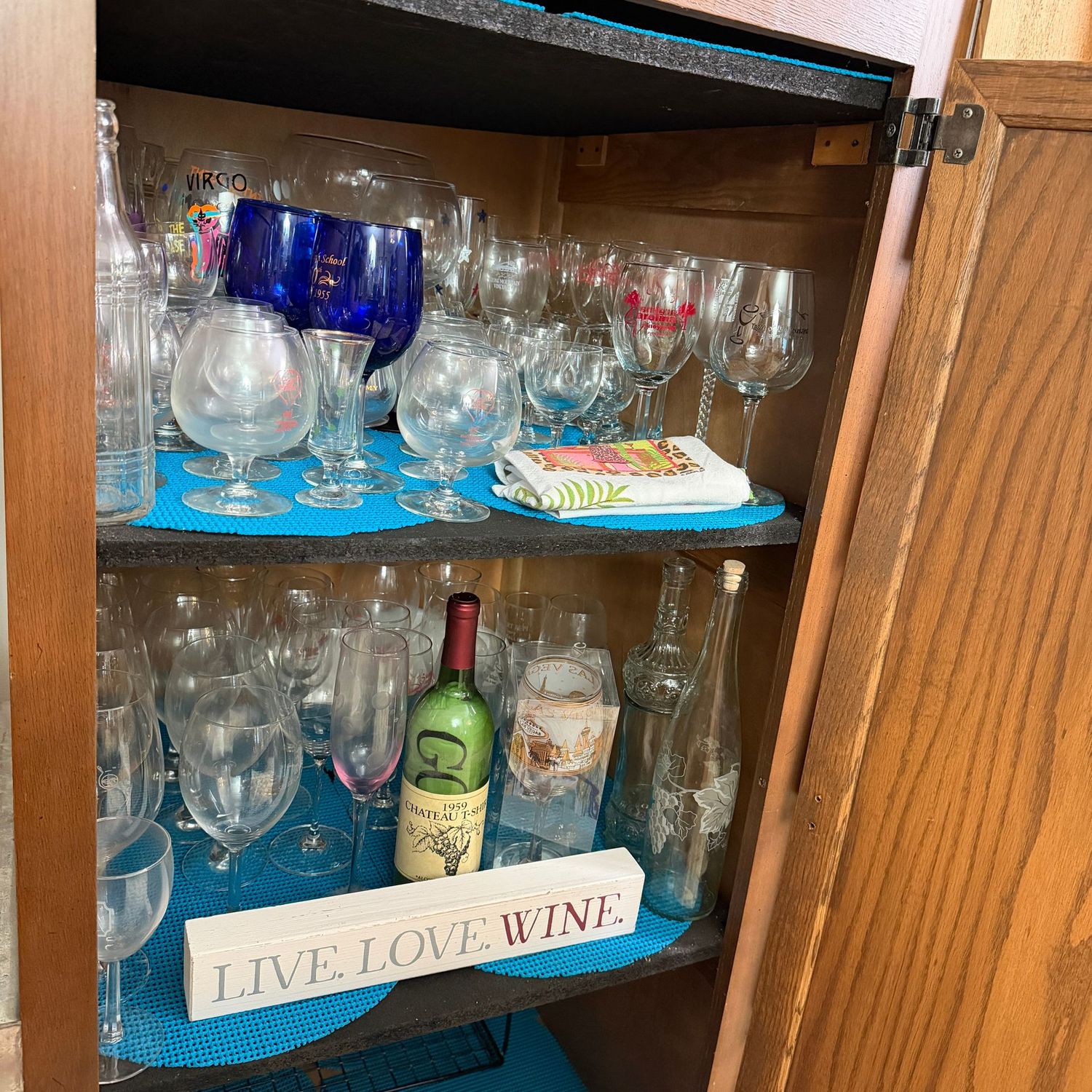 Two shelves of souvenir stemware, great for crafts/decorating S1217 Two shelves of souvenir stemware, great for crafts/decorating S1217