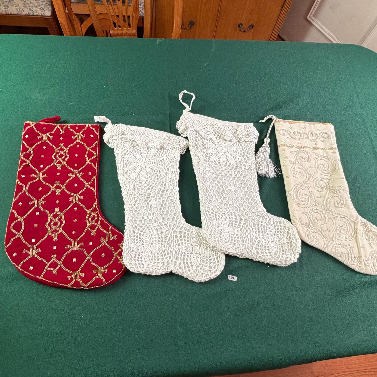 Four Christmas stockings, two crocheted and two beaded (cream one has a minor spot - see photo), largest is 17 Four Christmas stockings, two crocheted and two beaded (cream one has a minor spot - see photo), largest is 17"L, S1294